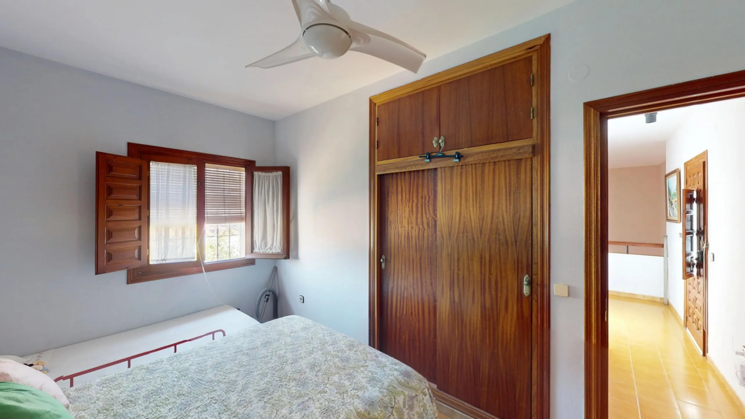This beautiful Spanish villa spans two floors and features three bedrooms, including an impressive primary suite, and two bathrooms, blending traditional Andalusian charm with modern comfort. The Mediterranean-inspired design is reflected in the terracott