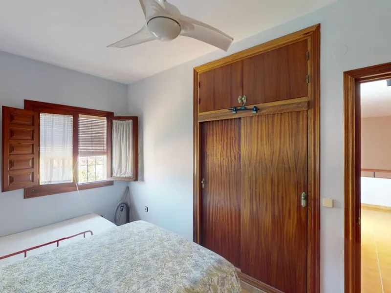 This beautiful Spanish villa spans two floors and features three bedrooms, including an impressive primary suite, and two bathrooms, blending traditional Andalusian charm with modern comfort. The Mediterranean-inspired design is reflected in the terracott