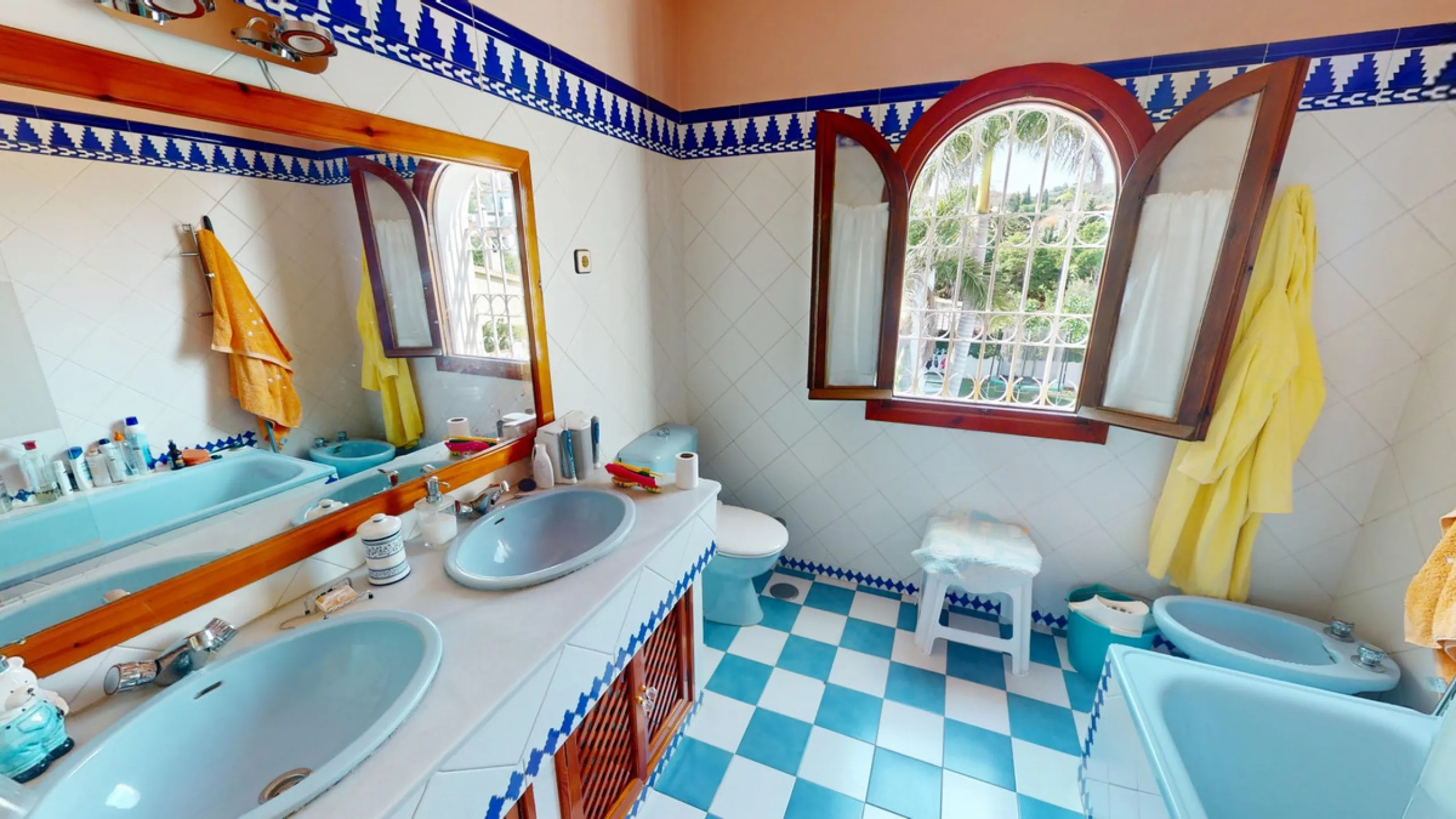 This beautiful Spanish villa spans two floors and features three bedrooms, including an impressive primary suite, and two bathrooms, blending traditional Andalusian charm with modern comfort. The Mediterranean-inspired design is reflected in the terracott