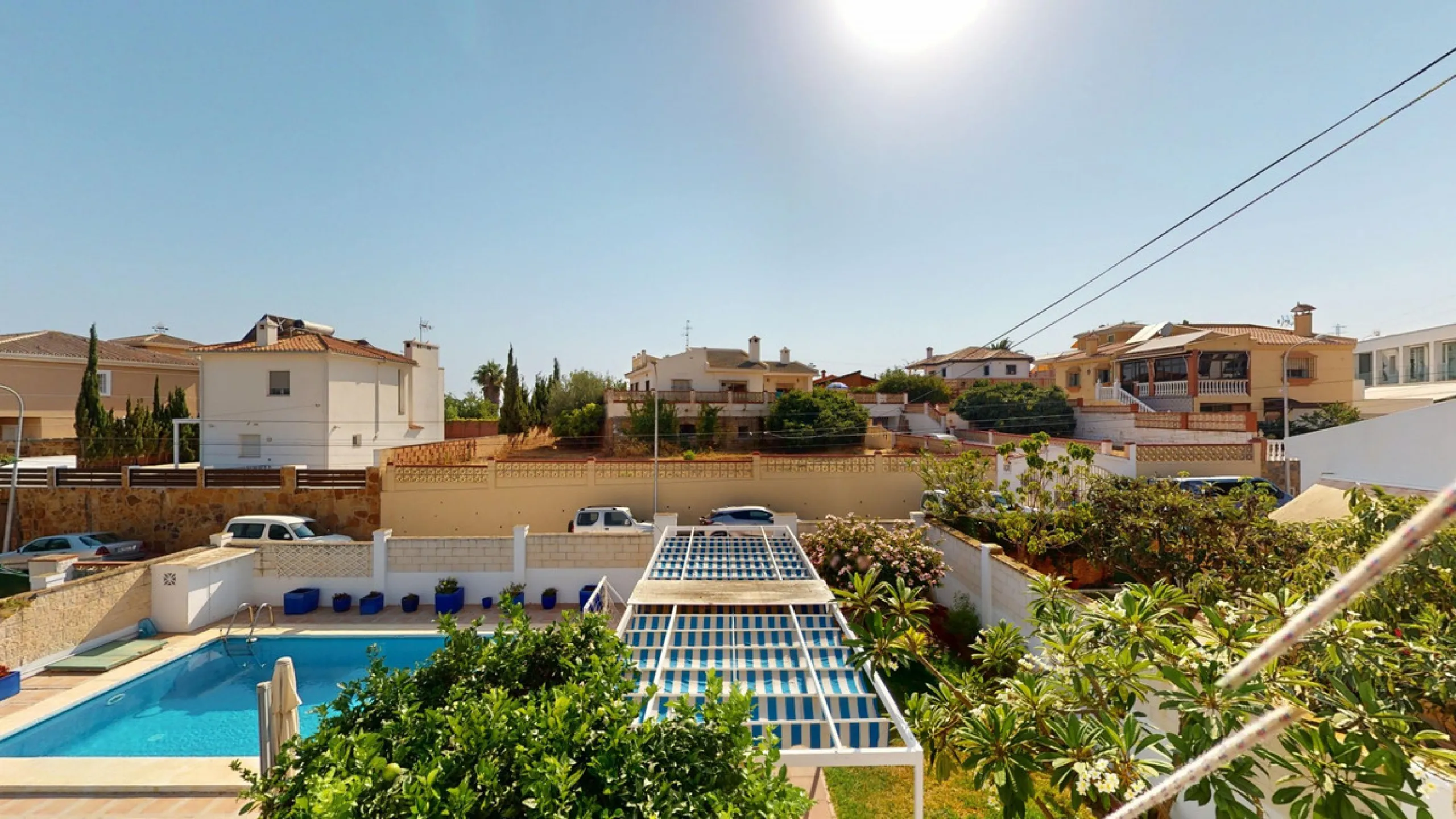 This beautiful Spanish villa spans two floors and features three bedrooms, including an impressive primary suite, and two bathrooms, blending traditional Andalusian charm with modern comfort. The Mediterranean-inspired design is reflected in the terracott