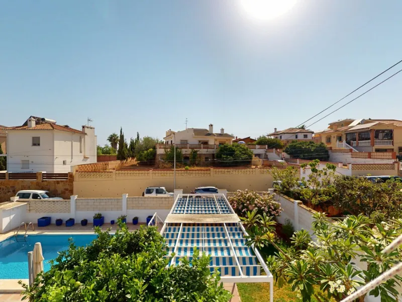 This beautiful Spanish villa spans two floors and features three bedrooms, including an impressive primary suite, and two bathrooms, blending traditional Andalusian charm with modern comfort. The Mediterranean-inspired design is reflected in the terracott