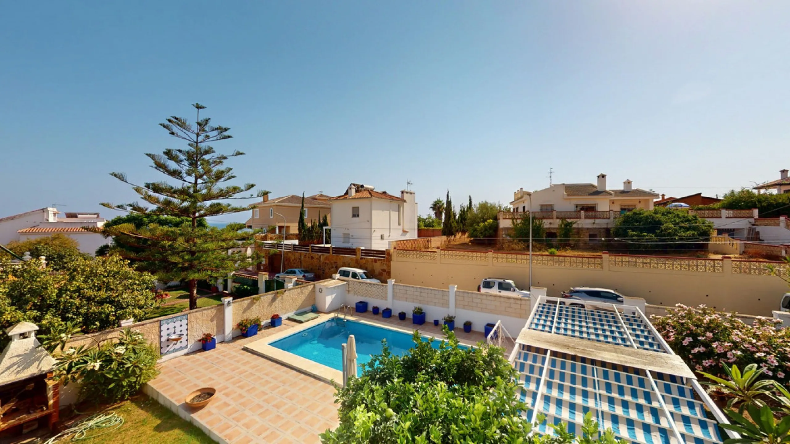 This beautiful Spanish villa spans two floors and features three bedrooms, including an impressive primary suite, and two bathrooms, blending traditional Andalusian charm with modern comfort. The Mediterranean-inspired design is reflected in the terracott