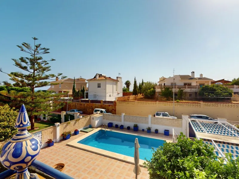 This beautiful Spanish villa spans two floors and features three bedrooms, including an impressive primary suite, and two bathrooms, blending traditional Andalusian charm with modern comfort. The Mediterranean-inspired design is reflected in the terracott