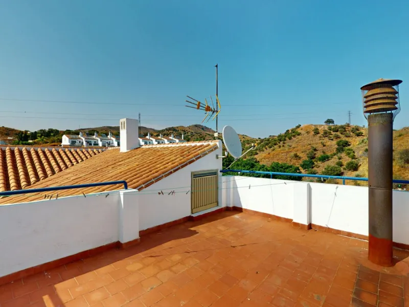 This beautiful Spanish villa spans two floors and features three bedrooms, including an impressive primary suite, and two bathrooms, blending traditional Andalusian charm with modern comfort. The Mediterranean-inspired design is reflected in the terracott