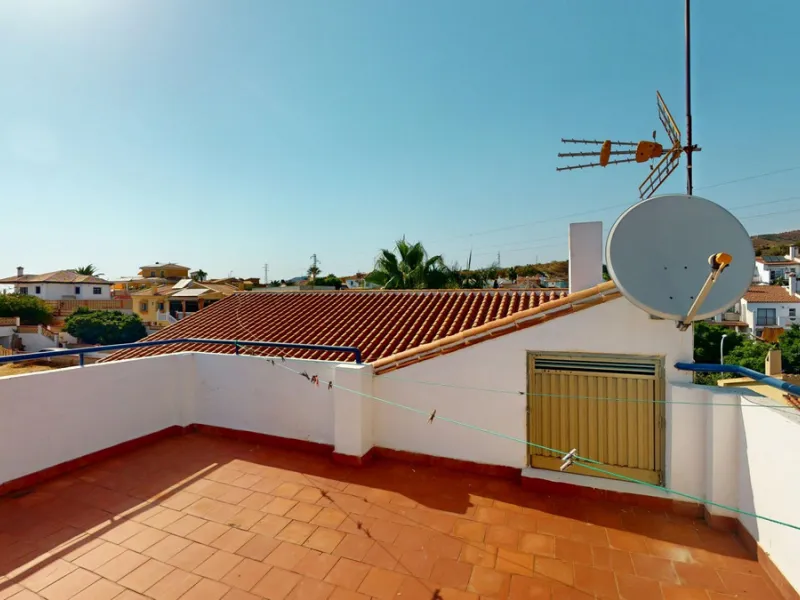 This beautiful Spanish villa spans two floors and features three bedrooms, including an impressive primary suite, and two bathrooms, blending traditional Andalusian charm with modern comfort. The Mediterranean-inspired design is reflected in the terracott