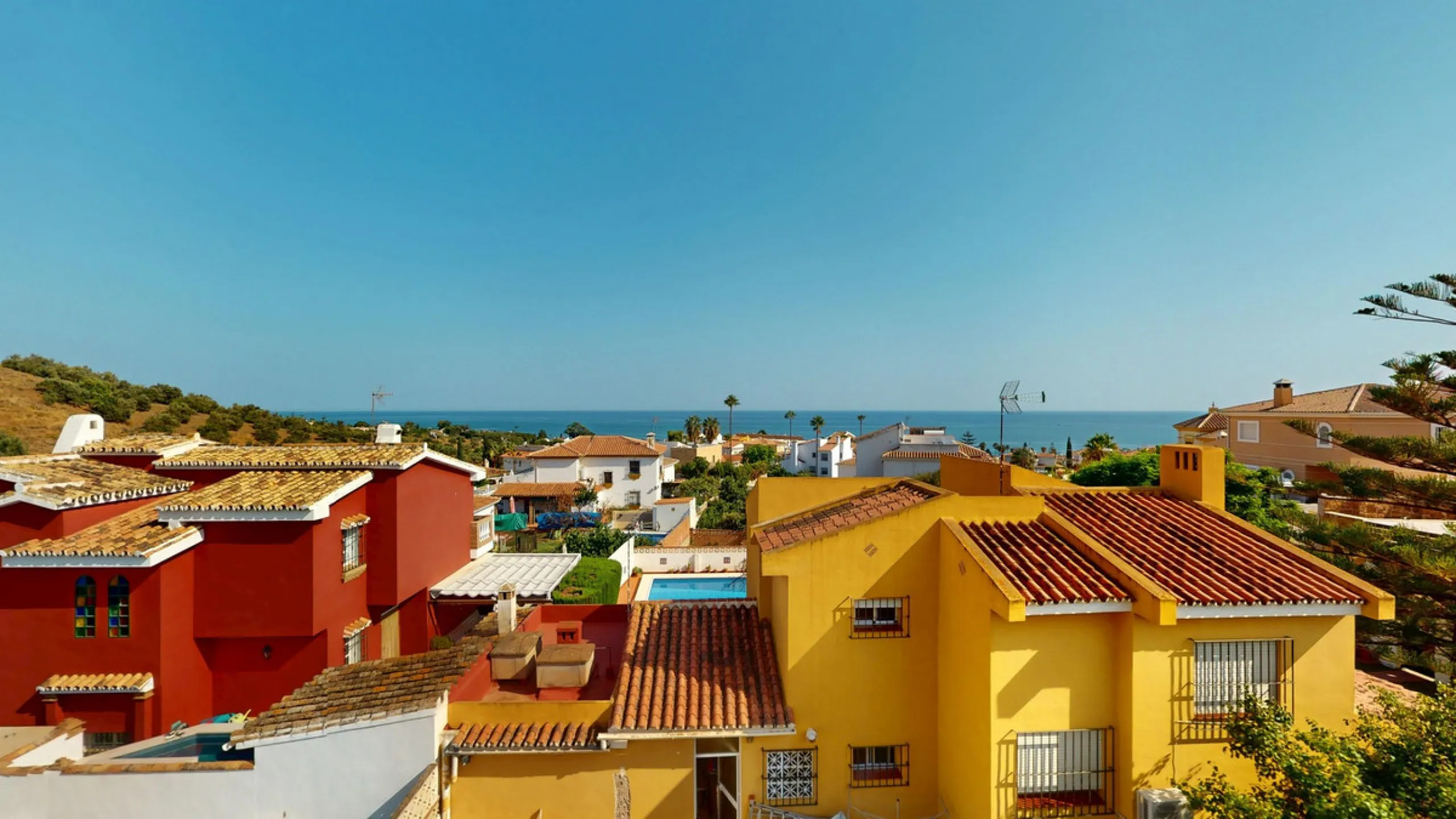 This beautiful Spanish villa spans two floors and features three bedrooms, including an impressive primary suite, and two bathrooms, blending traditional Andalusian charm with modern comfort. The Mediterranean-inspired design is reflected in the terracott