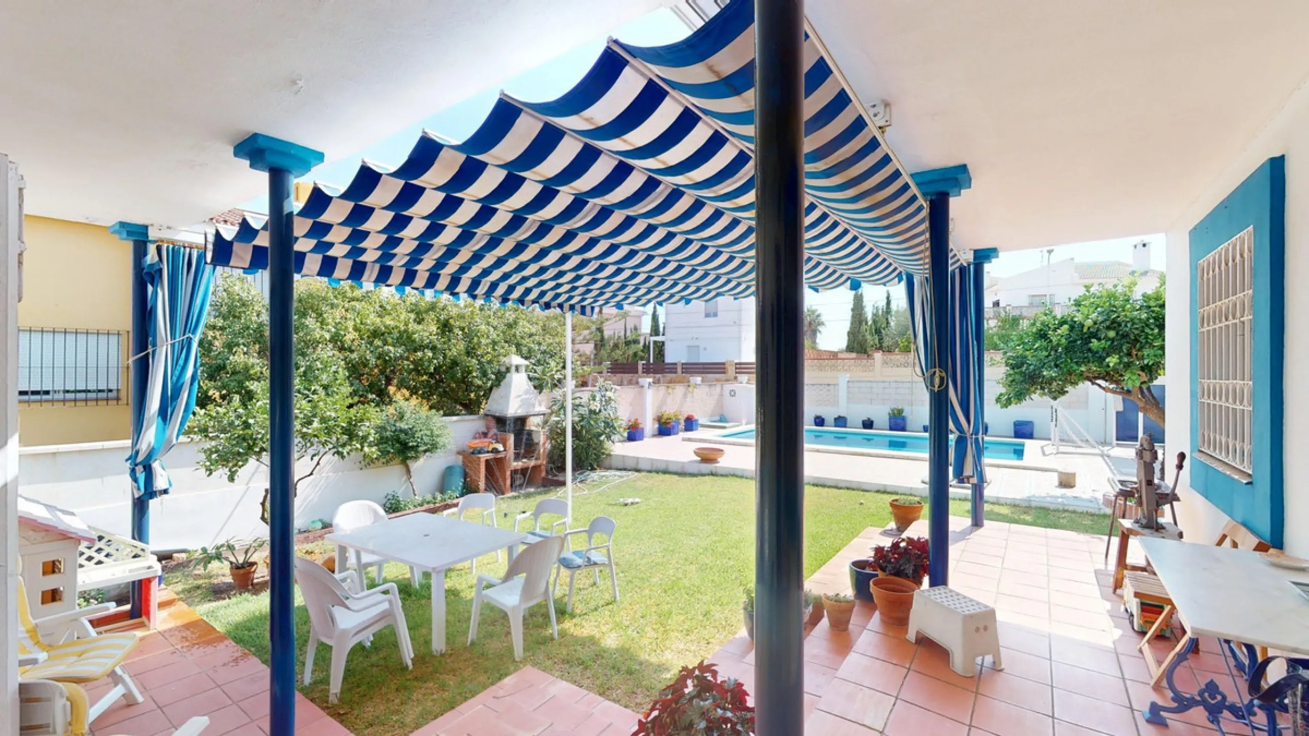 This beautiful Spanish villa spans two floors and features three bedrooms, including an impressive primary suite, and two bathrooms, blending traditional Andalusian charm with modern comfort. The Mediterranean-inspired design is reflected in the terracott