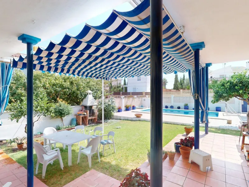 This beautiful Spanish villa spans two floors and features three bedrooms, including an impressive primary suite, and two bathrooms, blending traditional Andalusian charm with modern comfort. The Mediterranean-inspired design is reflected in the terracott