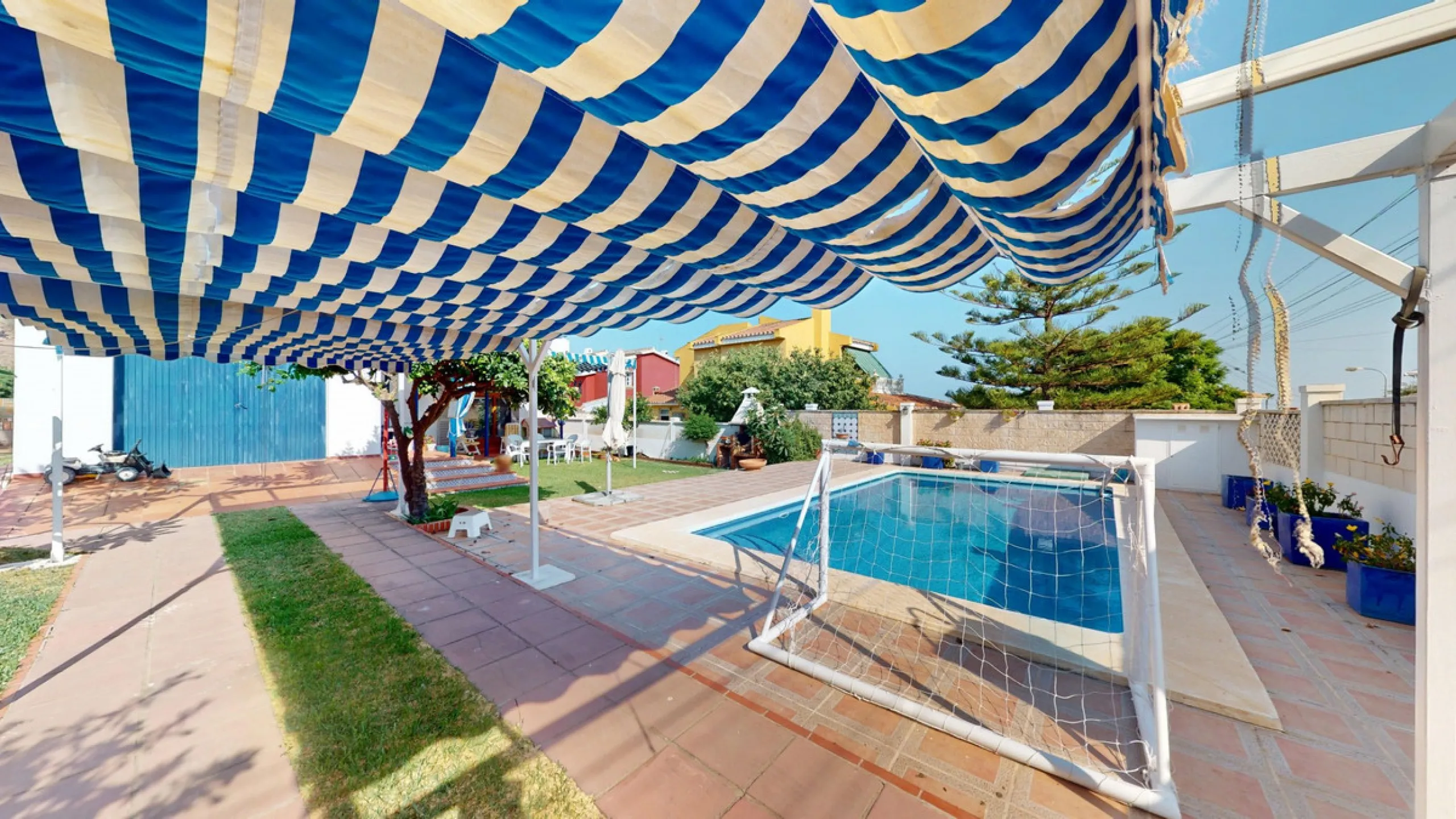This beautiful Spanish villa spans two floors and features three bedrooms, including an impressive primary suite, and two bathrooms, blending traditional Andalusian charm with modern comfort. The Mediterranean-inspired design is reflected in the terracott
