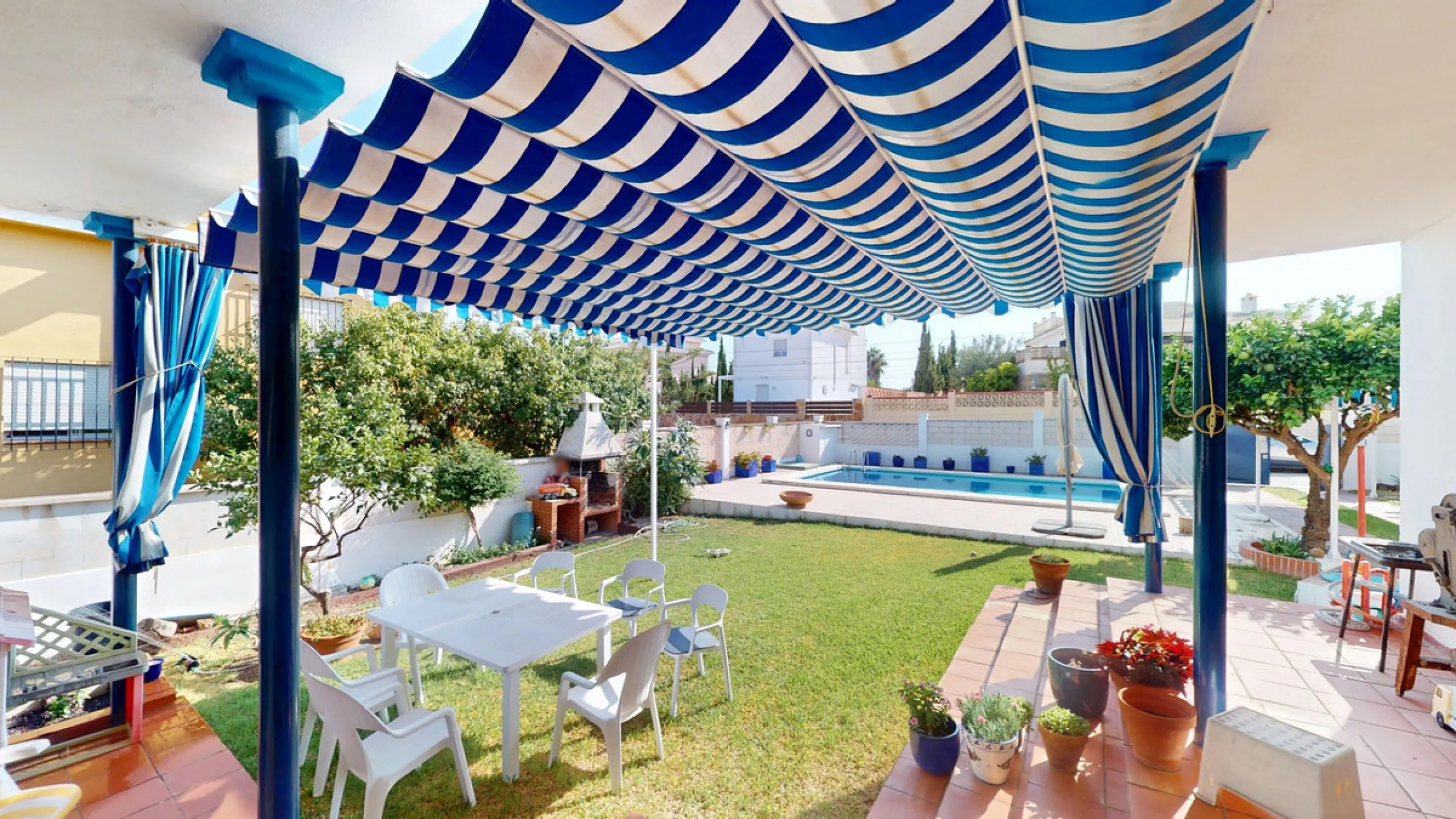 This beautiful Spanish villa spans two floors and features three bedrooms, including an impressive primary suite, and two bathrooms, blending traditional Andalusian charm with modern comfort. The Mediterranean-inspired design is reflected in the terracott