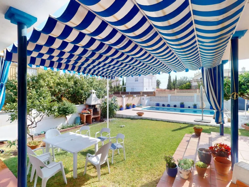 This beautiful Spanish villa spans two floors and features three bedrooms, including an impressive primary suite, and two bathrooms, blending traditional Andalusian charm with modern comfort. The Mediterranean-inspired design is reflected in the terracott
