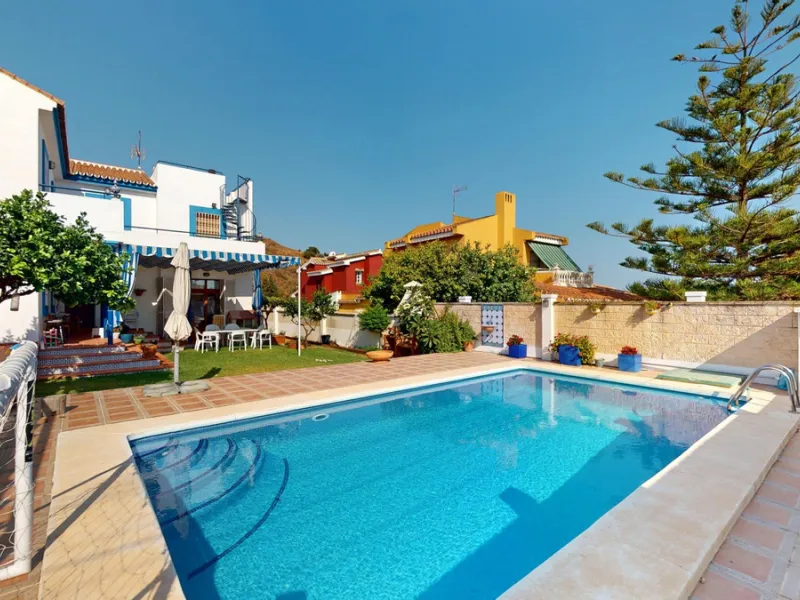 This beautiful Spanish villa spans two floors and features three bedrooms, including an impressive primary suite, and two bathrooms, blending traditional Andalusian charm with modern comfort. The Mediterranean-inspired design is reflected in the terracott