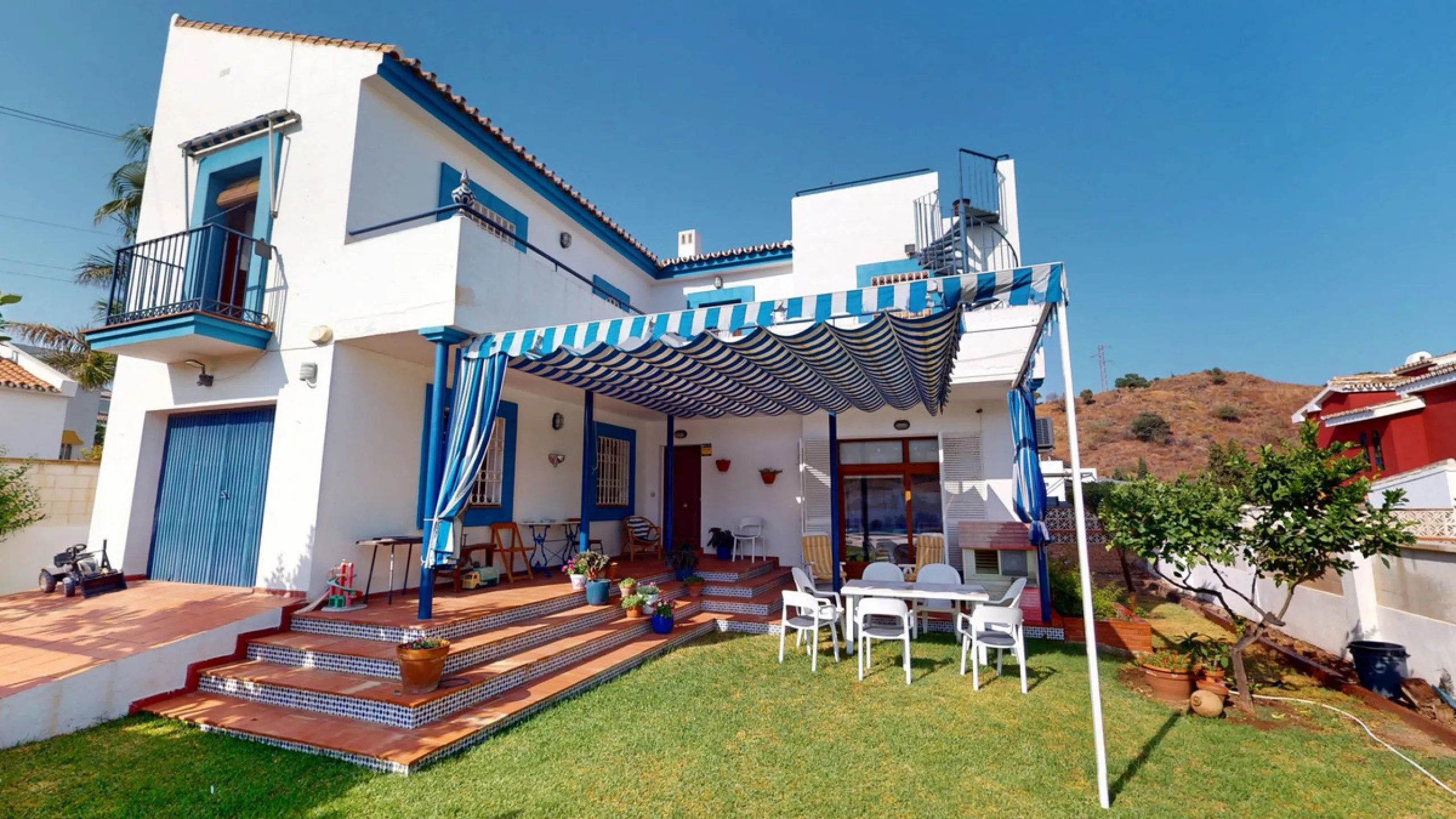 This beautiful Spanish villa spans two floors and features three bedrooms, including an impressive primary suite, and two bathrooms, blending traditional Andalusian charm with modern comfort. The Mediterranean-inspired design is reflected in the terracott