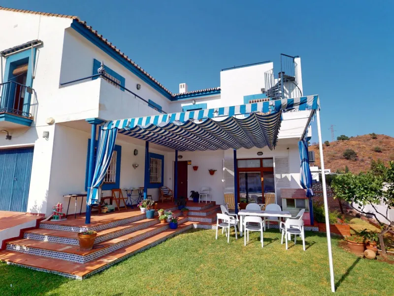 This beautiful Spanish villa spans two floors and features three bedrooms, including an impressive primary suite, and two bathrooms, blending traditional Andalusian charm with modern comfort. The Mediterranean-inspired design is reflected in the terracott
