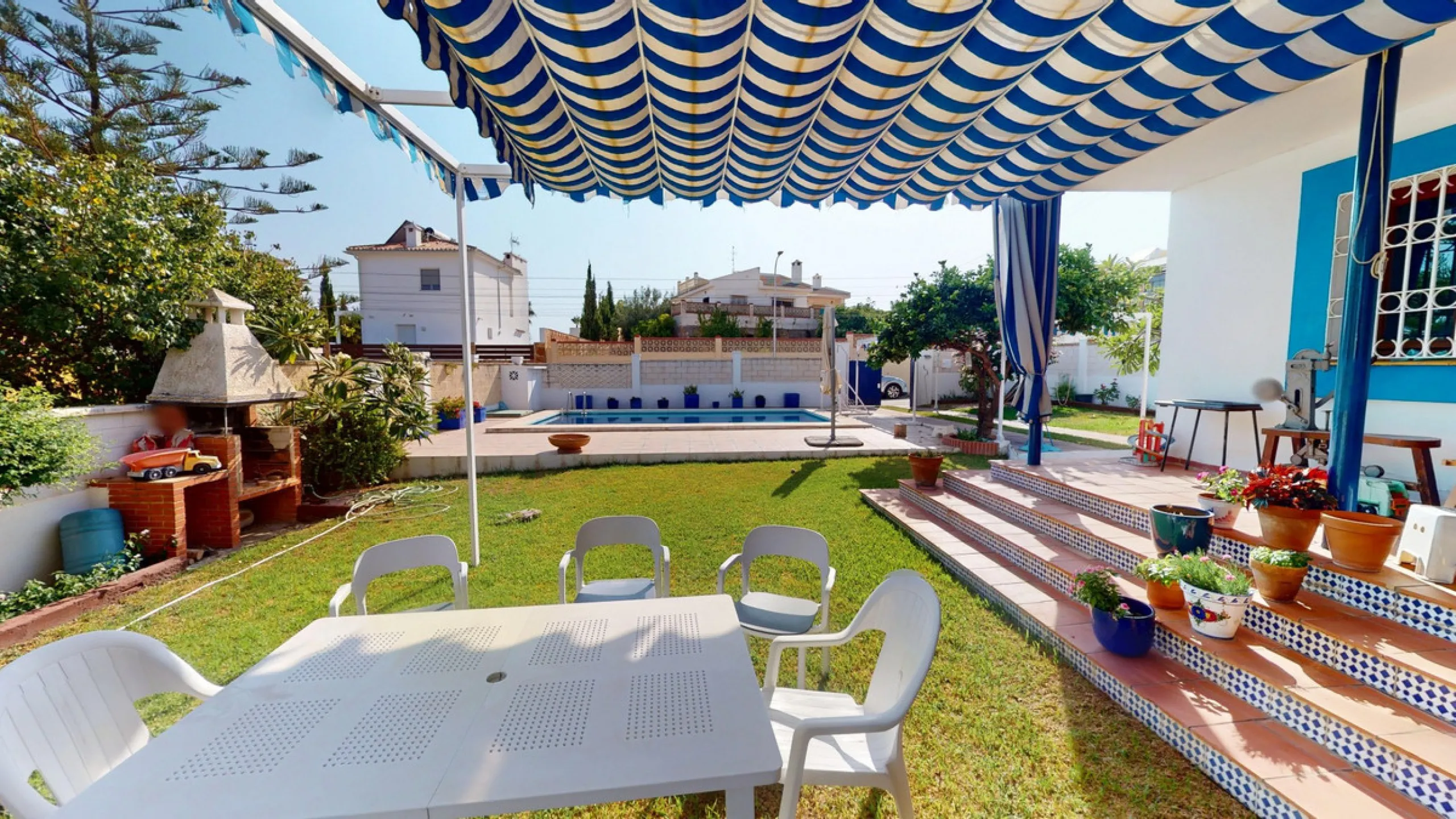 This beautiful Spanish villa spans two floors and features three bedrooms, including an impressive primary suite, and two bathrooms, blending traditional Andalusian charm with modern comfort. The Mediterranean-inspired design is reflected in the terracott