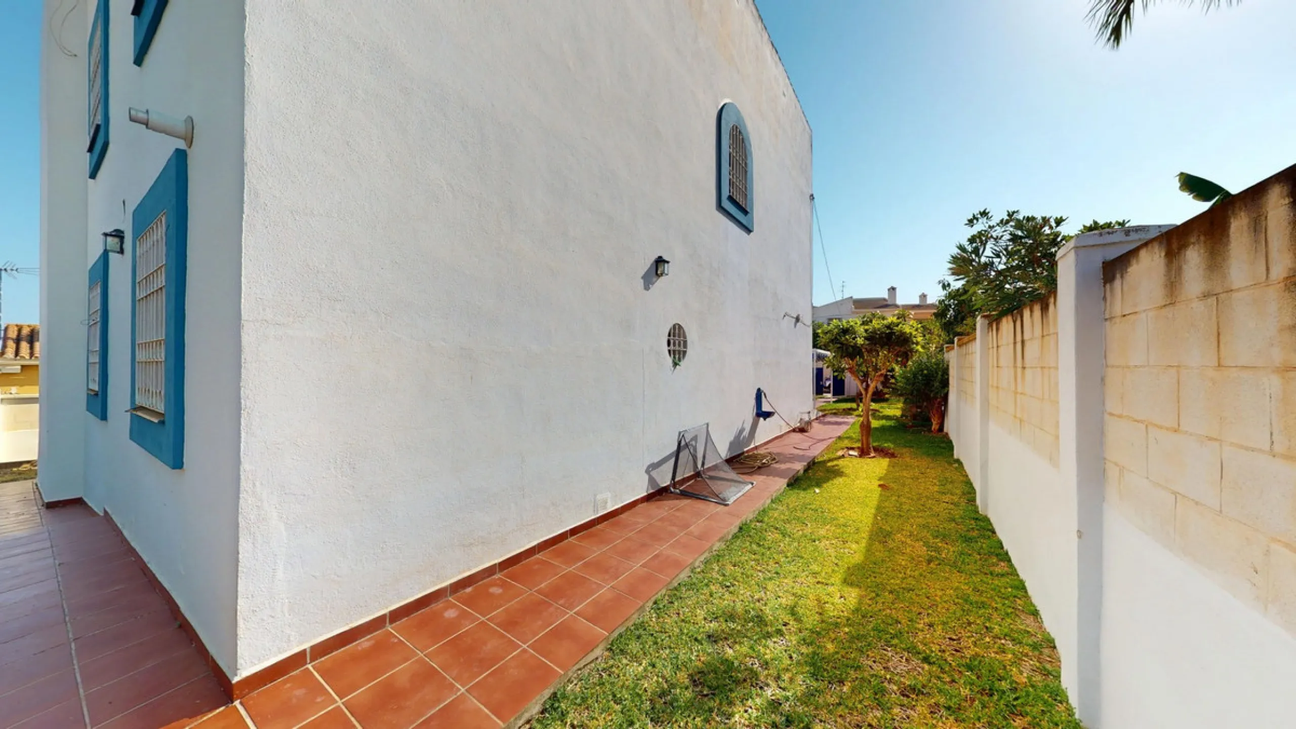 This beautiful Spanish villa spans two floors and features three bedrooms, including an impressive primary suite, and two bathrooms, blending traditional Andalusian charm with modern comfort. The Mediterranean-inspired design is reflected in the terracott