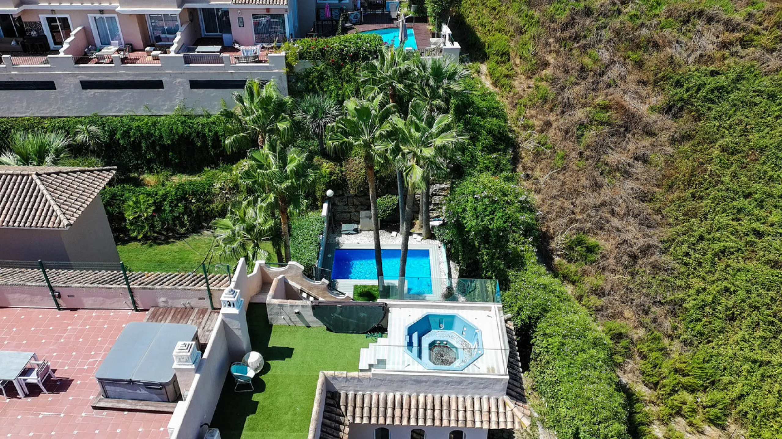 Experience luxury in this refurbished and modified semi-detached home featuring 4 bedrooms, 4 bathrooms, multiple terraces, and breathtaking panoramic views. Enjoy a private garden, private pool, and roof terrace with jacuzzi—all in a tranquil, private lo
