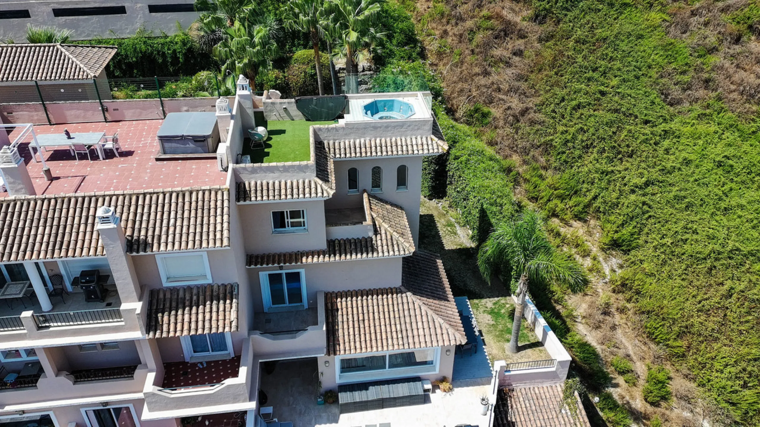 Experience luxury in this refurbished and modified semi-detached home featuring 4 bedrooms, 4 bathrooms, multiple terraces, and breathtaking panoramic views. Enjoy a private garden, private pool, and roof terrace with jacuzzi—all in a tranquil, private lo