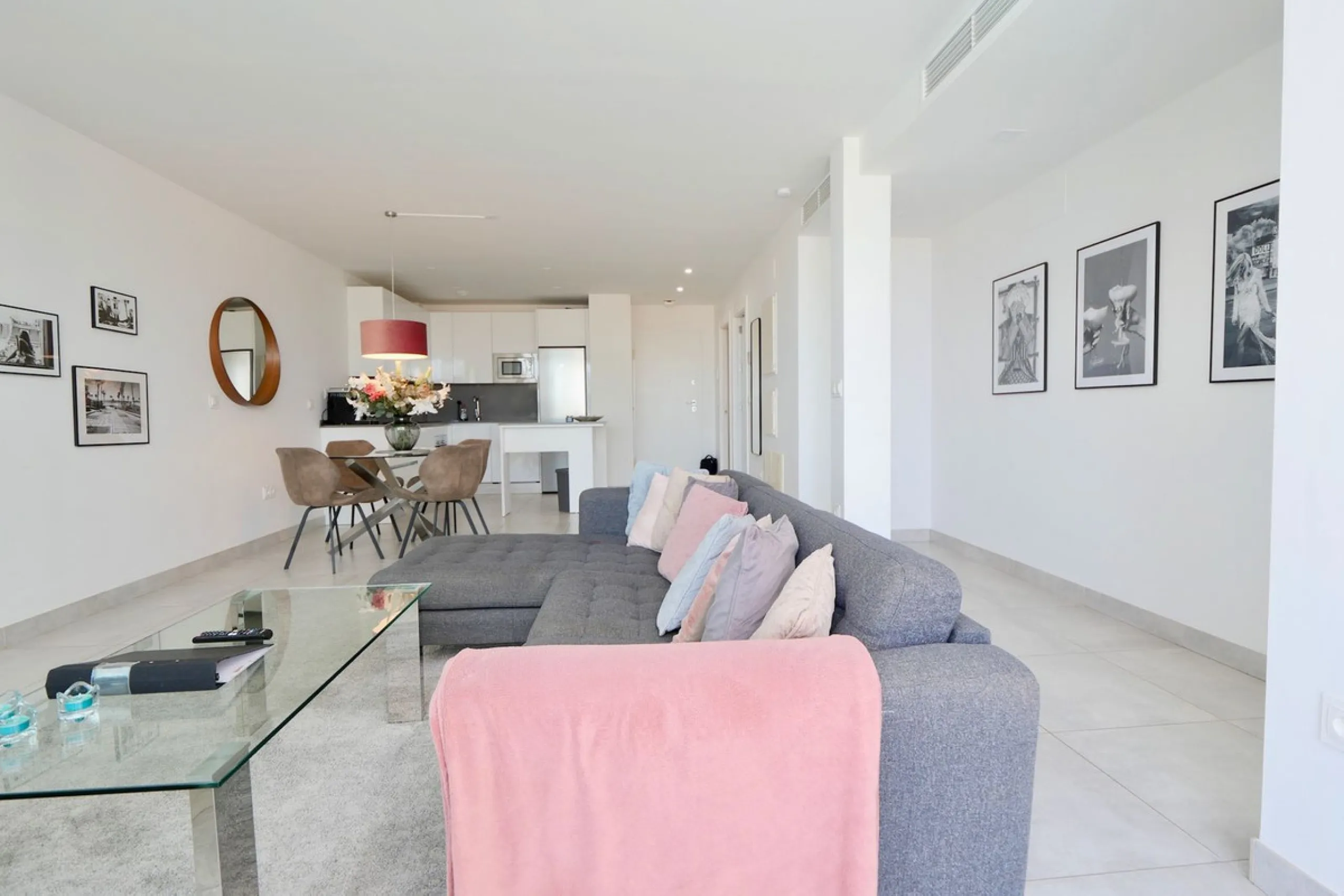 SHORT TERM RENTEL IS ALLOWED  -EASY VIEWING !!!!!!!!!!   This beautifully furnished 2-bedroom, 2-bathroom apartment is located in the exclusive Casa Banderas development in the charming fishing village of La Cala de Mijas. Just a short distance from the b