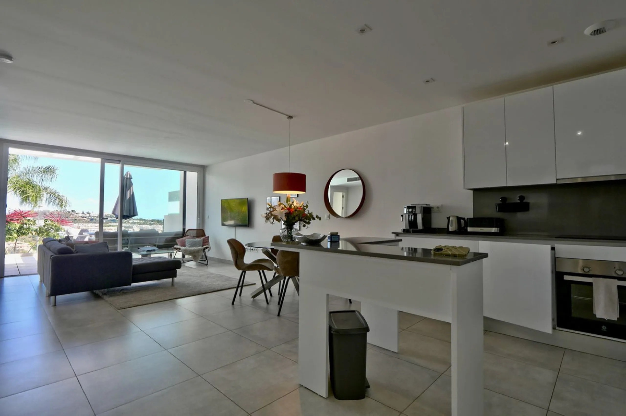 SHORT TERM RENTEL IS ALLOWED  -EASY VIEWING !!!!!!!!!!   This beautifully furnished 2-bedroom, 2-bathroom apartment is located in the exclusive Casa Banderas development in the charming fishing village of La Cala de Mijas. Just a short distance from the b