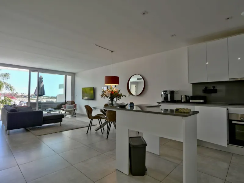 SHORT TERM RENTEL IS ALLOWED  -EASY VIEWING !!!!!!!!!!   This beautifully furnished 2-bedroom, 2-bathroom apartment is located in the exclusive Casa Banderas development in the charming fishing village of La Cala de Mijas. Just a short distance from the b