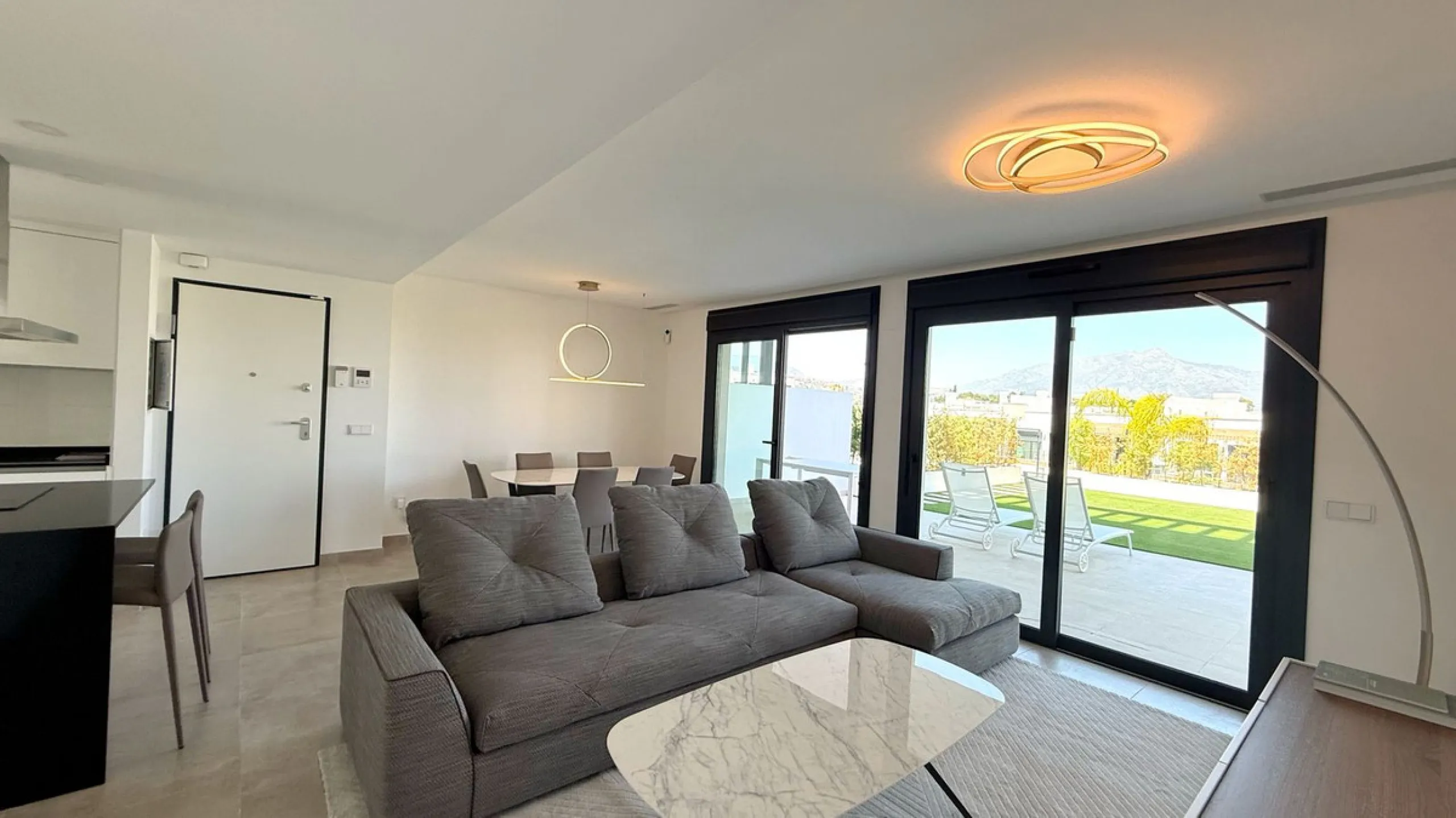 Discover a modern and luxurious lifestyle in this stunning apartment located in the sought-after area of Atalaya on the Costa del Sol. Situated within a gated community with 24-hour security, this property offers both tranquility and convenience, with nea