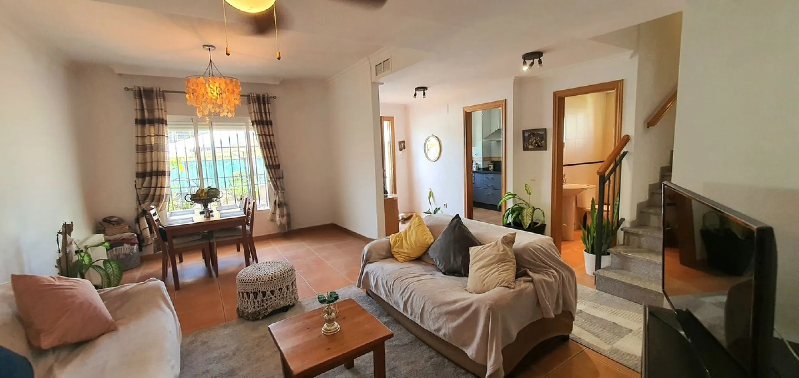 This exceptional large corner townhouse offers space, comfort, and versatility for the entire family.