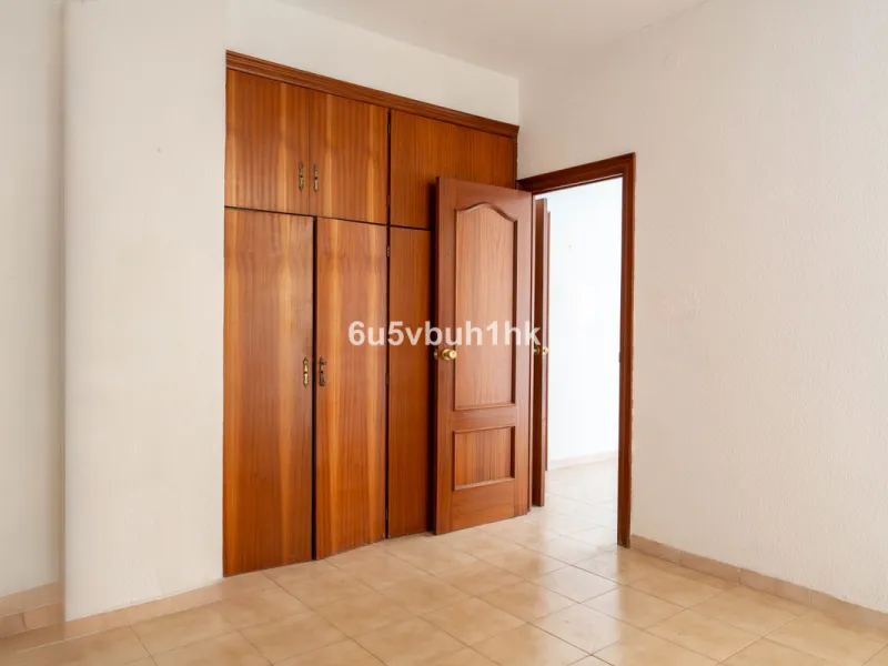 In the very heart of Málaga's historic centre, on the corner of two charming pedestrian streets, lies one of those treasures that makes the hearts of architecture lovers beat faster. This is not a move-in-ready home — it's an invitation to dream, to trans