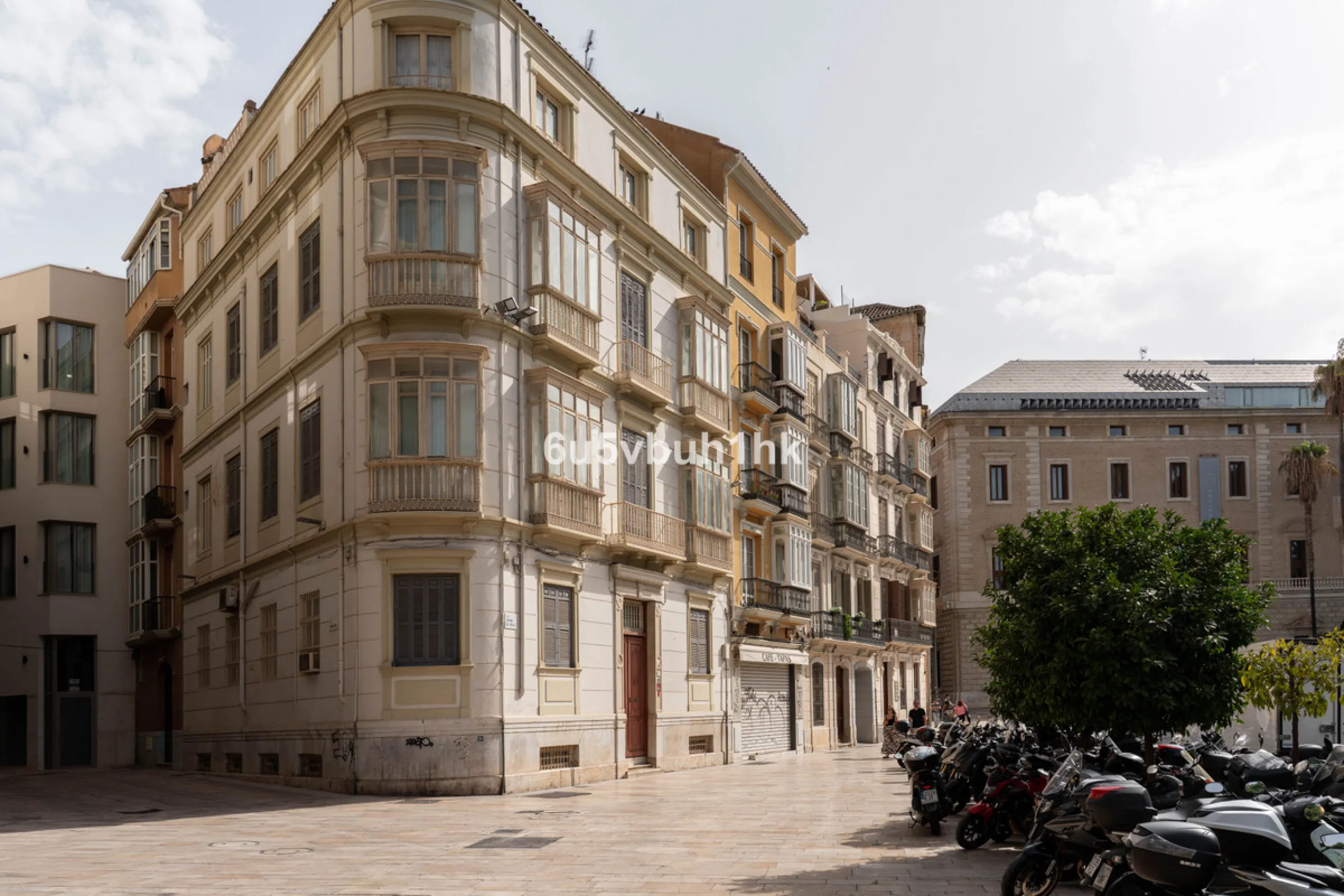 In the very heart of Málaga's historic centre, on the corner of two charming pedestrian streets, lies one of those treasures that makes the hearts of architecture lovers beat faster. This is not a move-in-ready home — it's an invitation to dream, to trans