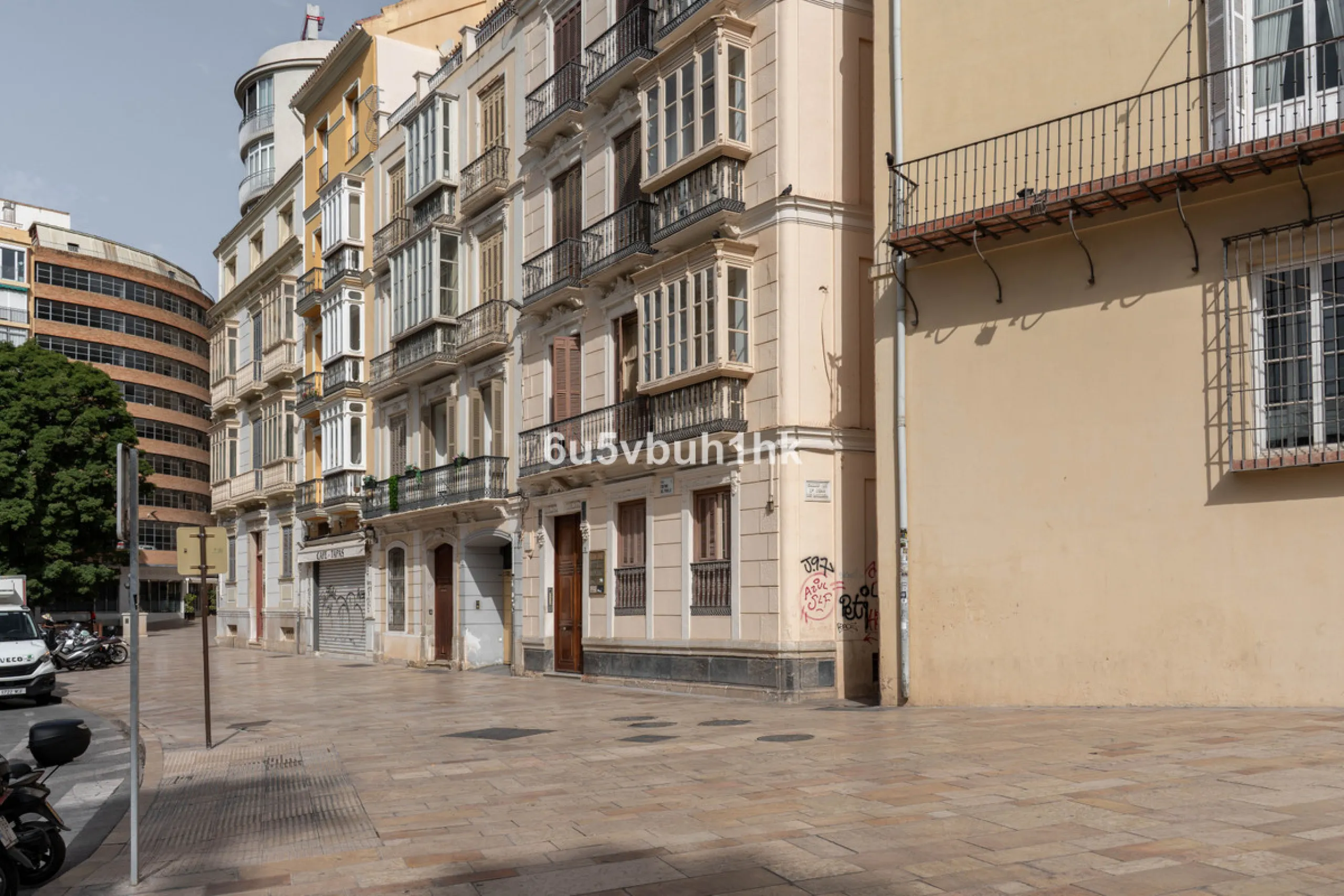 In the very heart of Málaga's historic centre, on the corner of two charming pedestrian streets, lies one of those treasures that makes the hearts of architecture lovers beat faster. This is not a move-in-ready home — it's an invitation to dream, to trans
