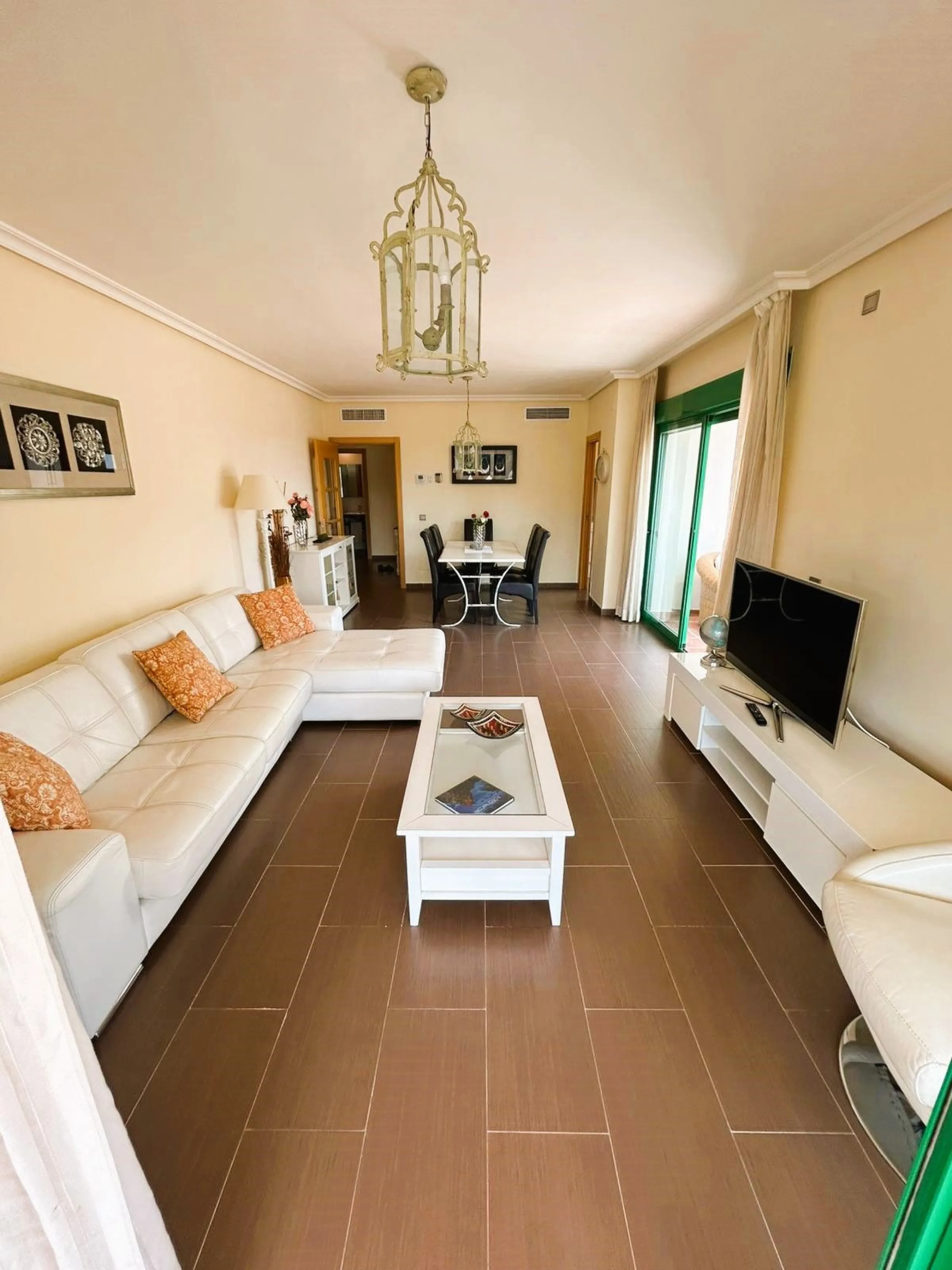 Located in Selwo, Estepona, this bright corner apartment, built in 2007, is set within a peaceful and well-maintained community. It features 2 double bedrooms, 2 bathrooms, and a spectacular south and west-facing terrace, perfect for enjoying the spacious