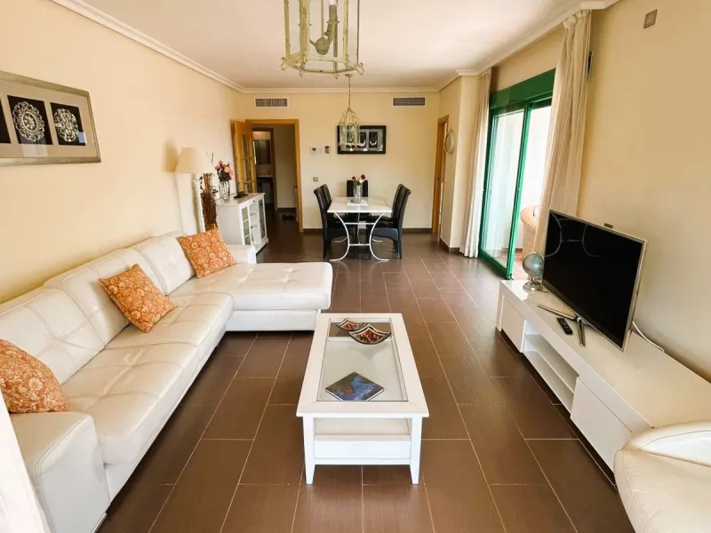Located in Selwo, Estepona, this bright corner apartment, built in 2007, is set within a peaceful and well-maintained community. It features 2 double bedrooms, 2 bathrooms, and a spectacular south and west-facing terrace, perfect for enjoying the spacious