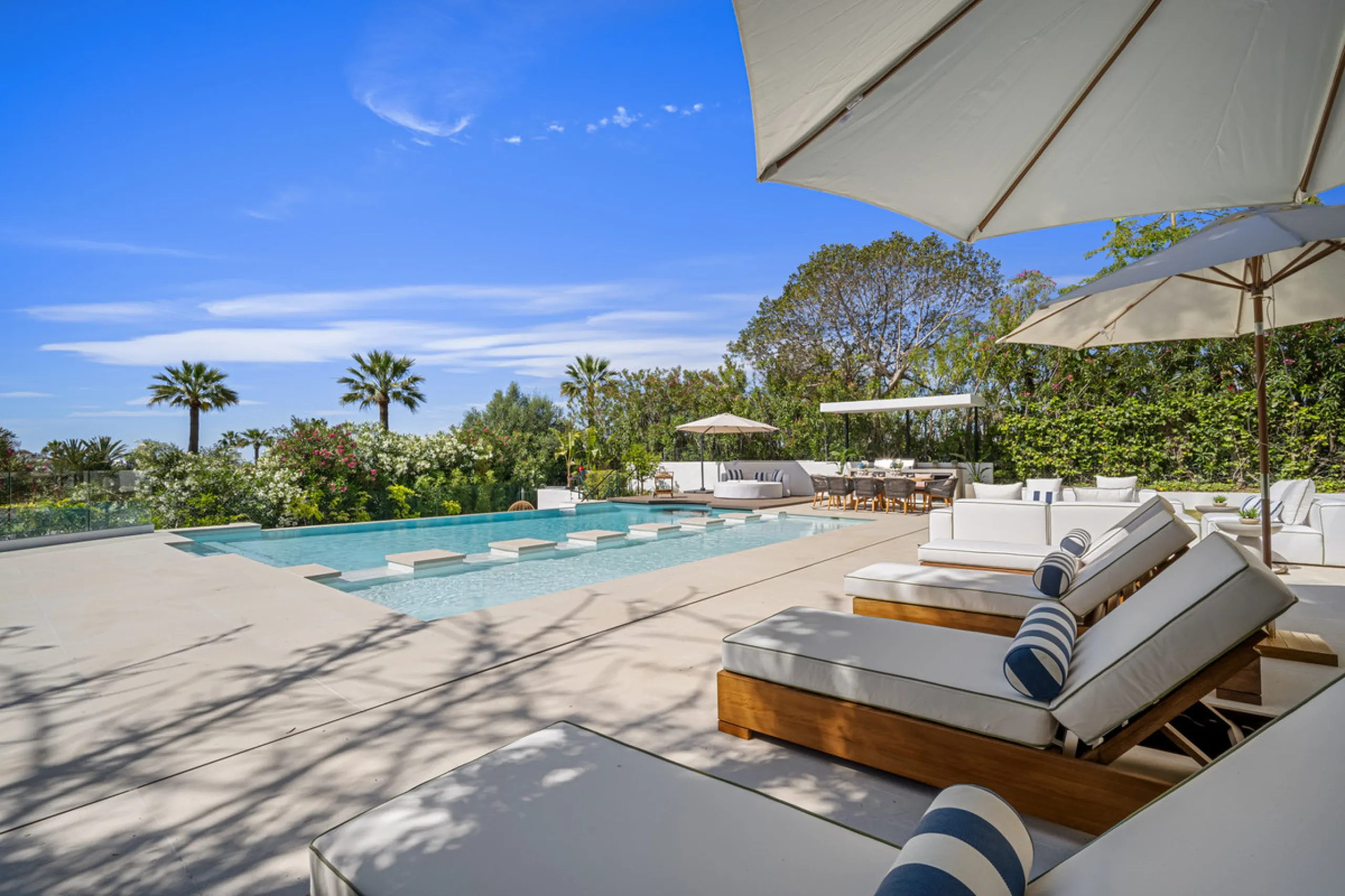 Boasting of unparalleled architecture and unrivalled construction quality, the villa offers sophisticated and contemporary living, sitting on a private plot within a secure community with breathtaking front-line panoramic views towards Los Naranjos Golf c