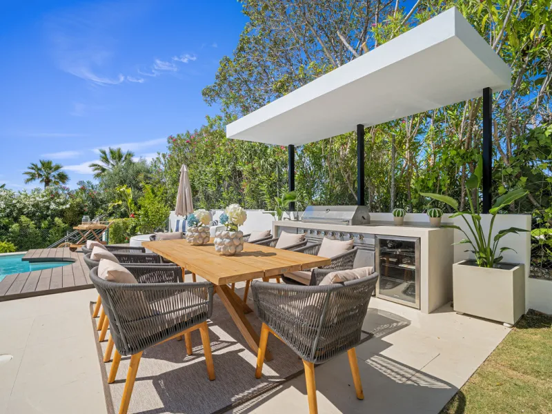 Boasting of unparalleled architecture and unrivalled construction quality, the villa offers sophisticated and contemporary living, sitting on a private plot within a secure community with breathtaking front-line panoramic views towards Los Naranjos Golf c