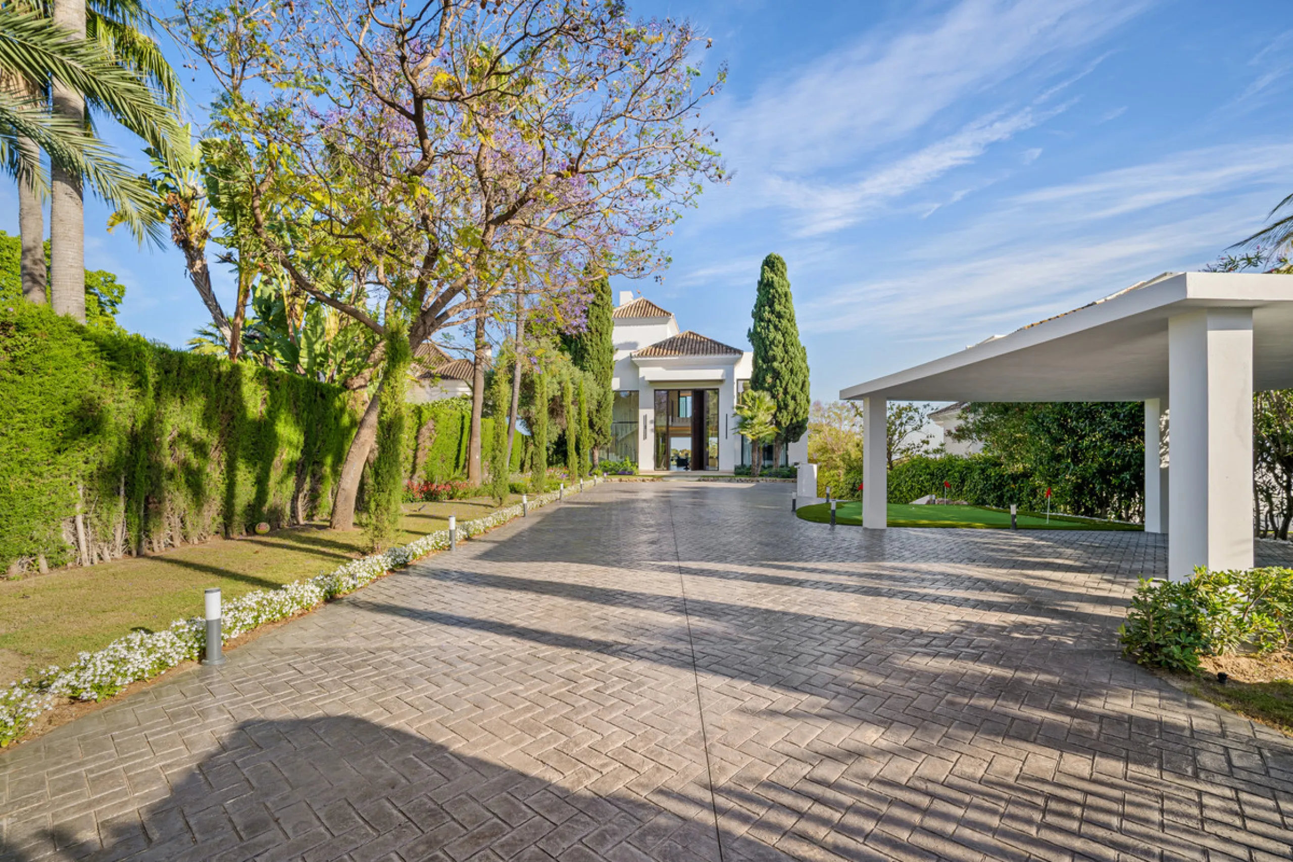 Boasting of unparalleled architecture and unrivalled construction quality, the villa offers sophisticated and contemporary living, sitting on a private plot within a secure community with breathtaking front-line panoramic views towards Los Naranjos Golf c