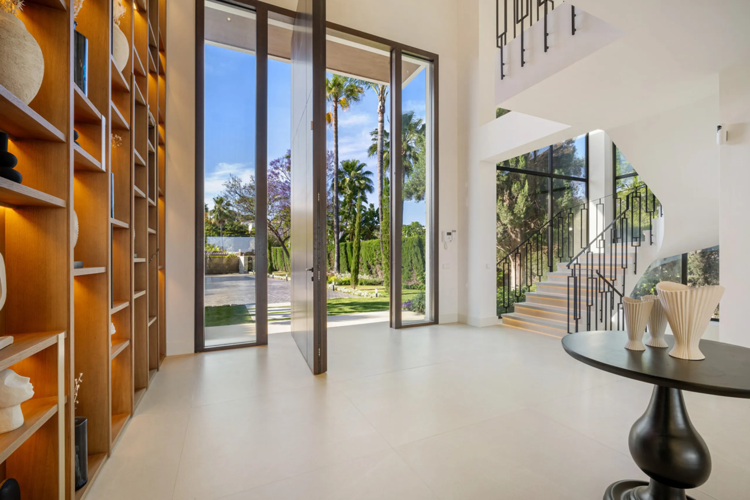 Boasting of unparalleled architecture and unrivalled construction quality, the villa offers sophisticated and contemporary living, sitting on a private plot within a secure community with breathtaking front-line panoramic views towards Los Naranjos Golf c