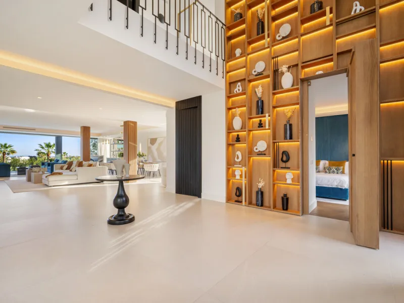 Boasting of unparalleled architecture and unrivalled construction quality, the villa offers sophisticated and contemporary living, sitting on a private plot within a secure community with breathtaking front-line panoramic views towards Los Naranjos Golf c