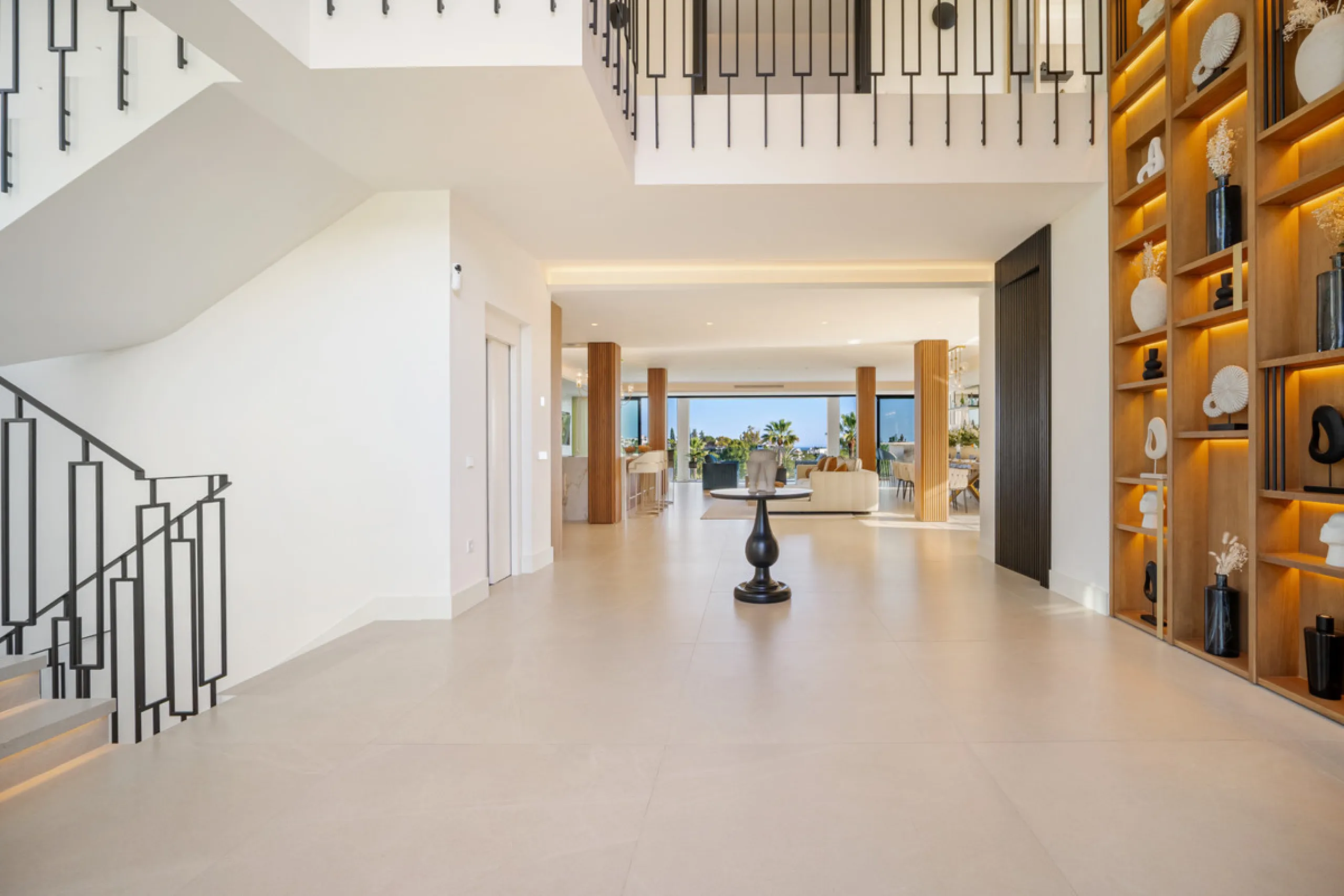 Boasting of unparalleled architecture and unrivalled construction quality, the villa offers sophisticated and contemporary living, sitting on a private plot within a secure community with breathtaking front-line panoramic views towards Los Naranjos Golf c