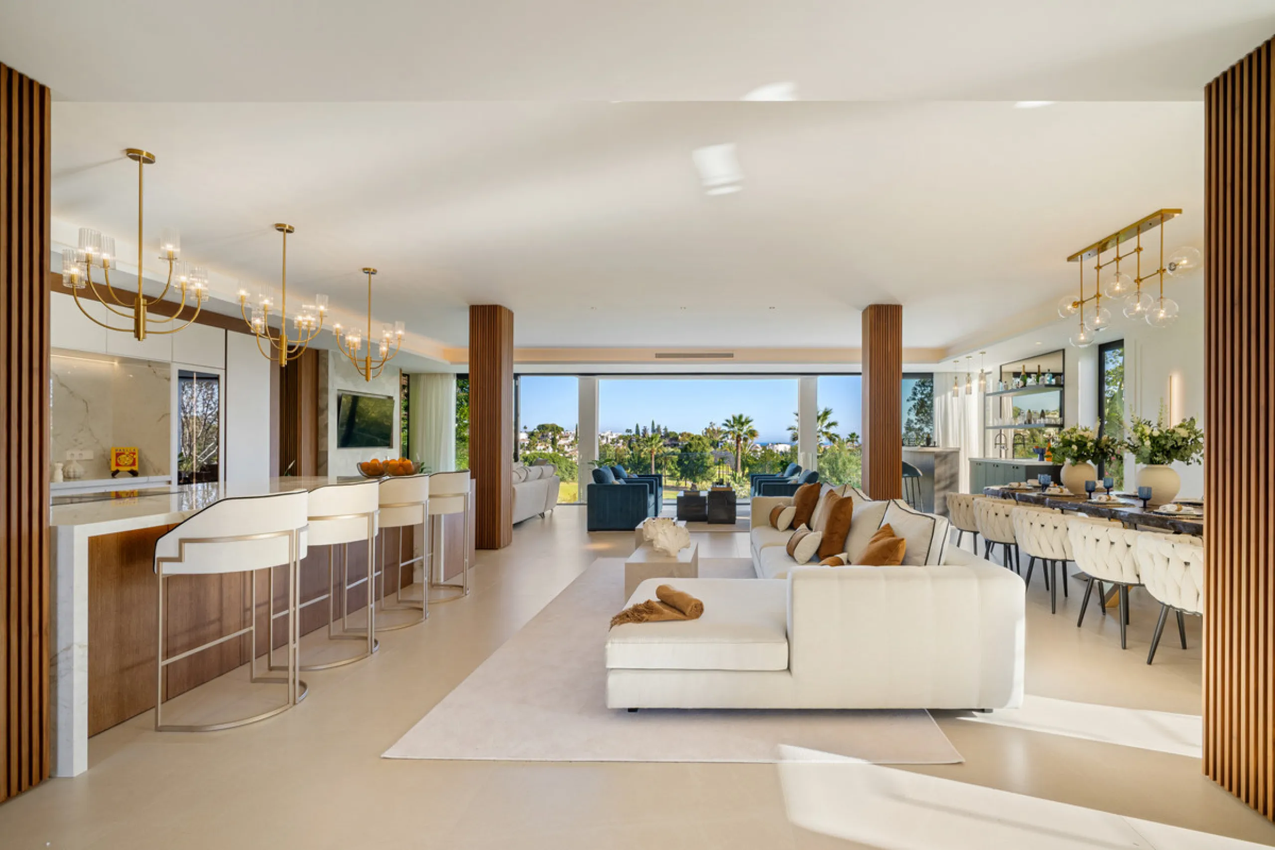 Boasting of unparalleled architecture and unrivalled construction quality, the villa offers sophisticated and contemporary living, sitting on a private plot within a secure community with breathtaking front-line panoramic views towards Los Naranjos Golf c