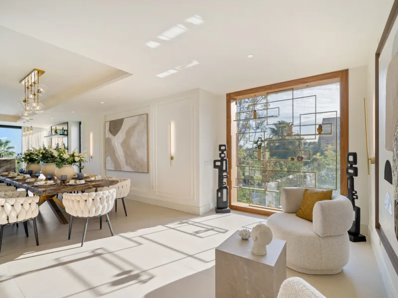 Boasting of unparalleled architecture and unrivalled construction quality, the villa offers sophisticated and contemporary living, sitting on a private plot within a secure community with breathtaking front-line panoramic views towards Los Naranjos Golf c