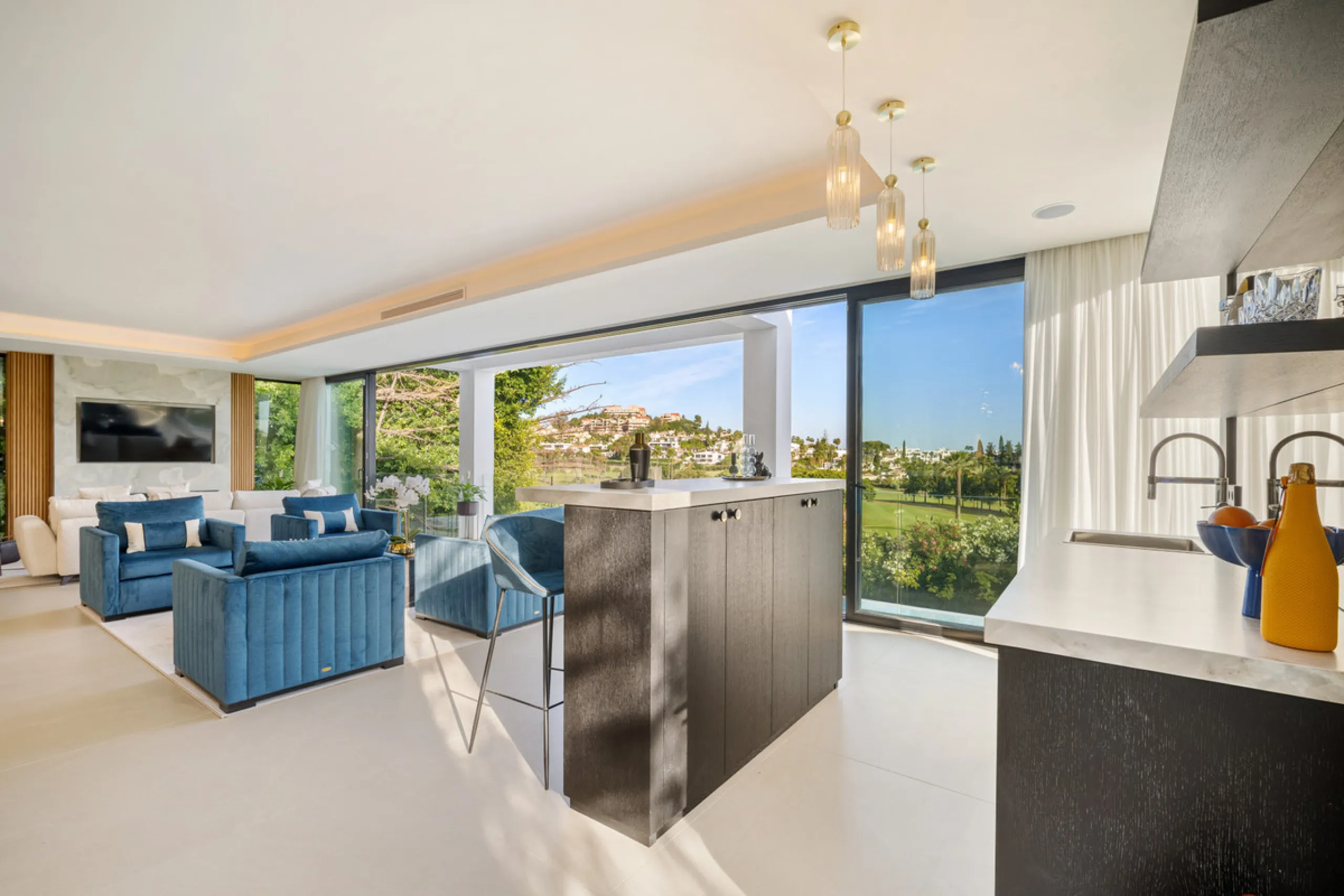 Boasting of unparalleled architecture and unrivalled construction quality, the villa offers sophisticated and contemporary living, sitting on a private plot within a secure community with breathtaking front-line panoramic views towards Los Naranjos Golf c