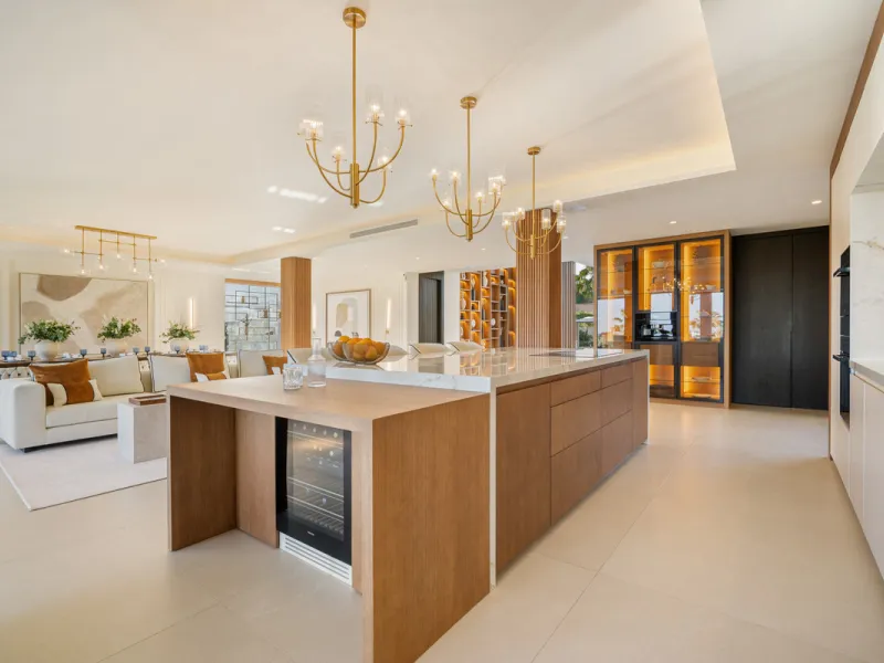Boasting of unparalleled architecture and unrivalled construction quality, the villa offers sophisticated and contemporary living, sitting on a private plot within a secure community with breathtaking front-line panoramic views towards Los Naranjos Golf c