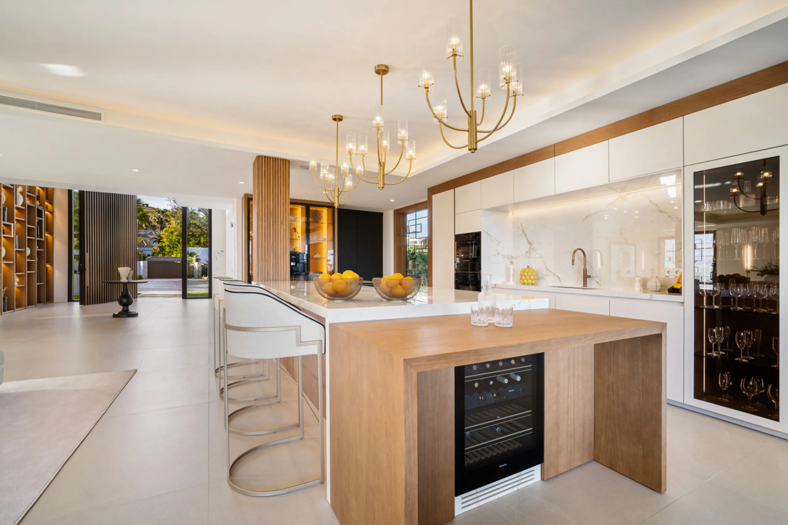 Boasting of unparalleled architecture and unrivalled construction quality, the villa offers sophisticated and contemporary living, sitting on a private plot within a secure community with breathtaking front-line panoramic views towards Los Naranjos Golf c