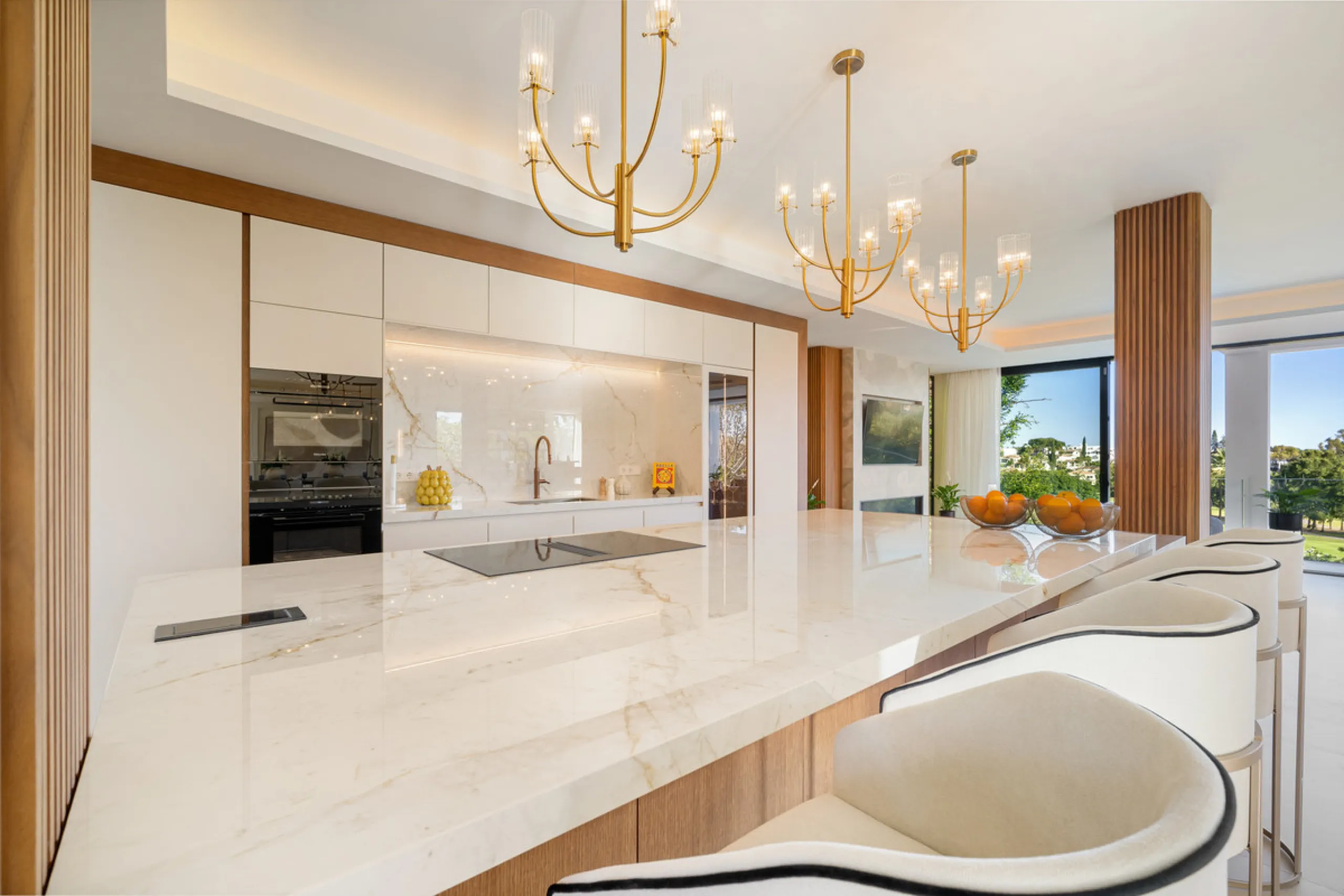 Boasting of unparalleled architecture and unrivalled construction quality, the villa offers sophisticated and contemporary living, sitting on a private plot within a secure community with breathtaking front-line panoramic views towards Los Naranjos Golf c