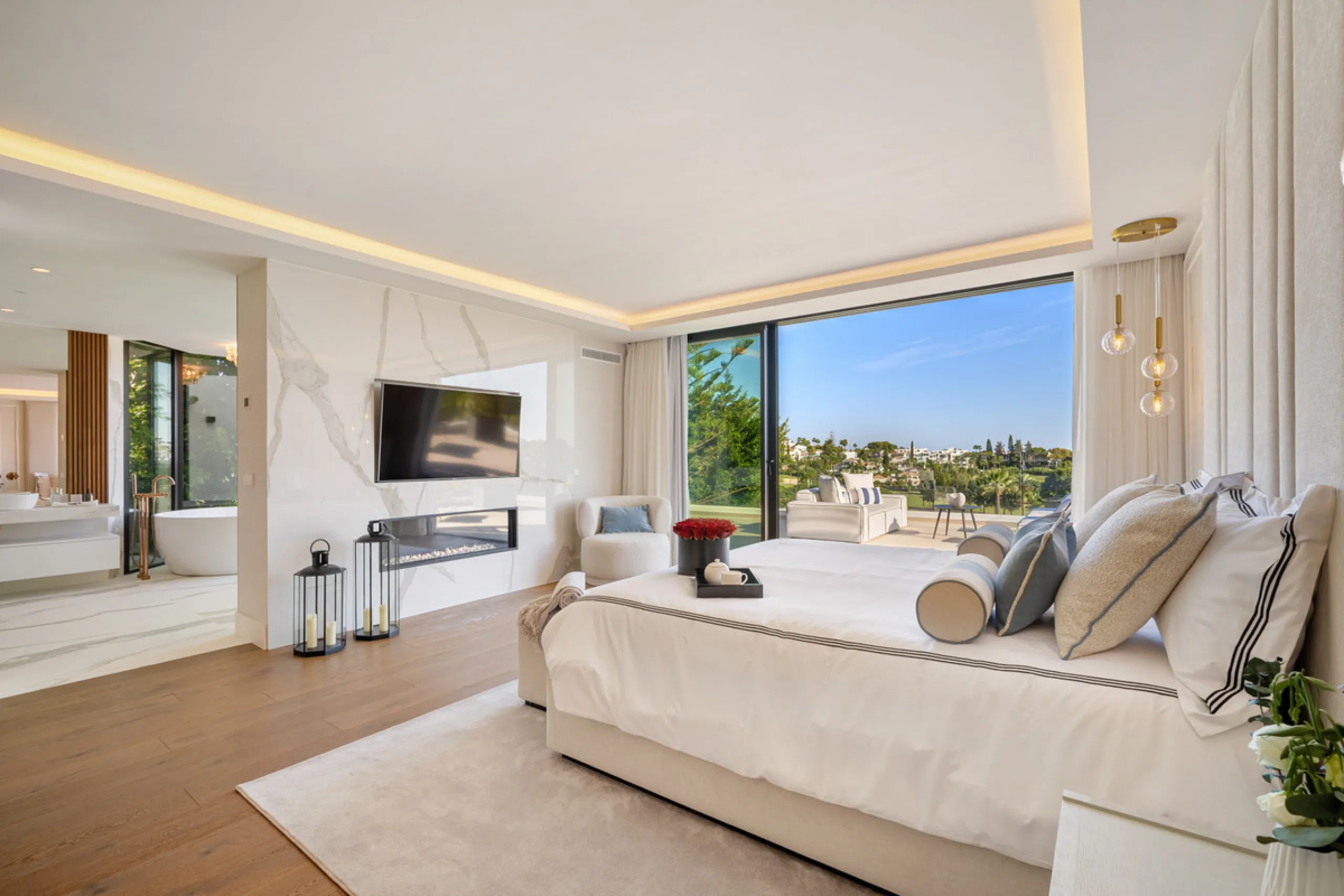 Boasting of unparalleled architecture and unrivalled construction quality, the villa offers sophisticated and contemporary living, sitting on a private plot within a secure community with breathtaking front-line panoramic views towards Los Naranjos Golf c