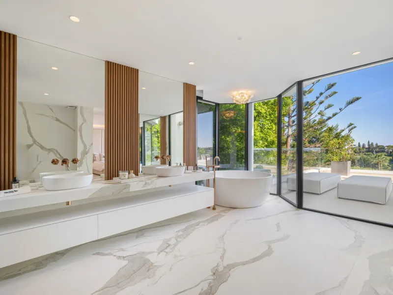 Boasting of unparalleled architecture and unrivalled construction quality, the villa offers sophisticated and contemporary living, sitting on a private plot within a secure community with breathtaking front-line panoramic views towards Los Naranjos Golf c