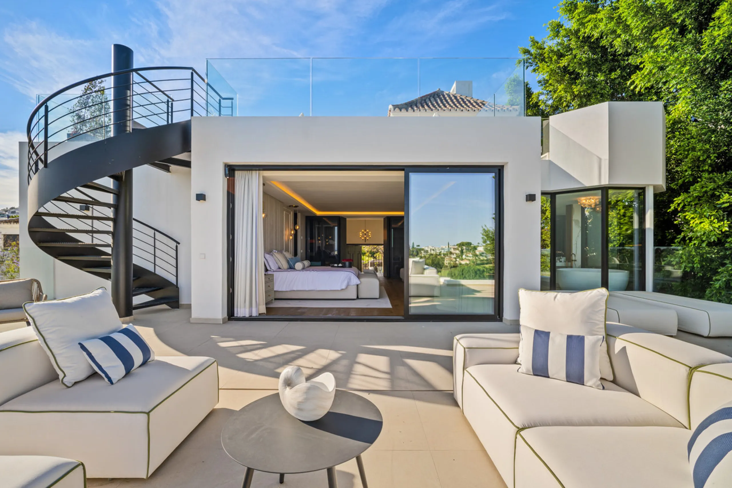 Boasting of unparalleled architecture and unrivalled construction quality, the villa offers sophisticated and contemporary living, sitting on a private plot within a secure community with breathtaking front-line panoramic views towards Los Naranjos Golf c