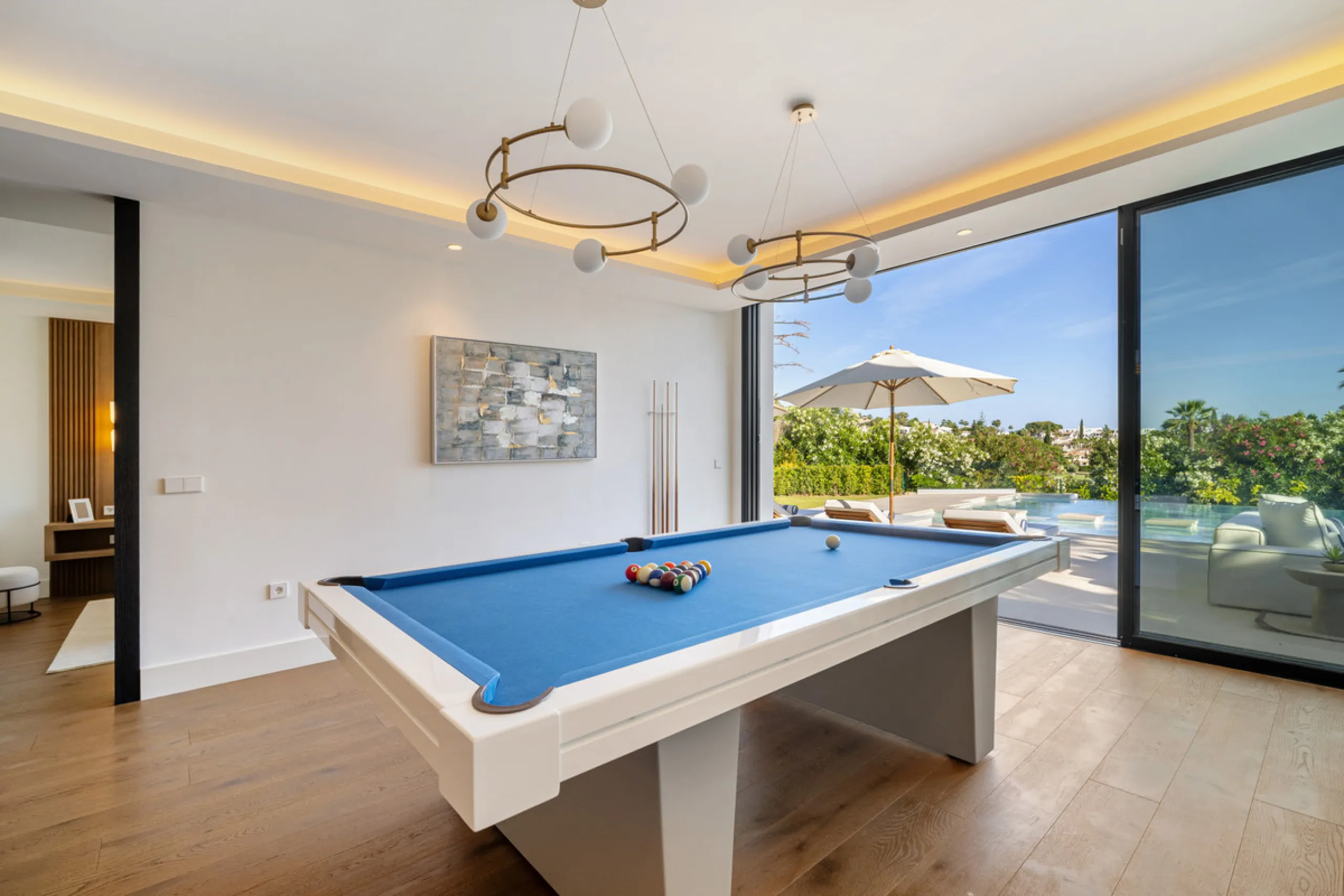 Boasting of unparalleled architecture and unrivalled construction quality, the villa offers sophisticated and contemporary living, sitting on a private plot within a secure community with breathtaking front-line panoramic views towards Los Naranjos Golf c