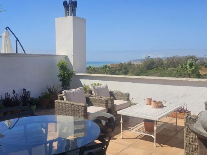 Beautiful south-facing penthouse with 3 bedrooms and 2 bathrooms, featuring stunning views from multiple terraces. The master bedroom includes an en-suite bathroom, and all bedrooms come with built-in wardrobes and access to private terraces.