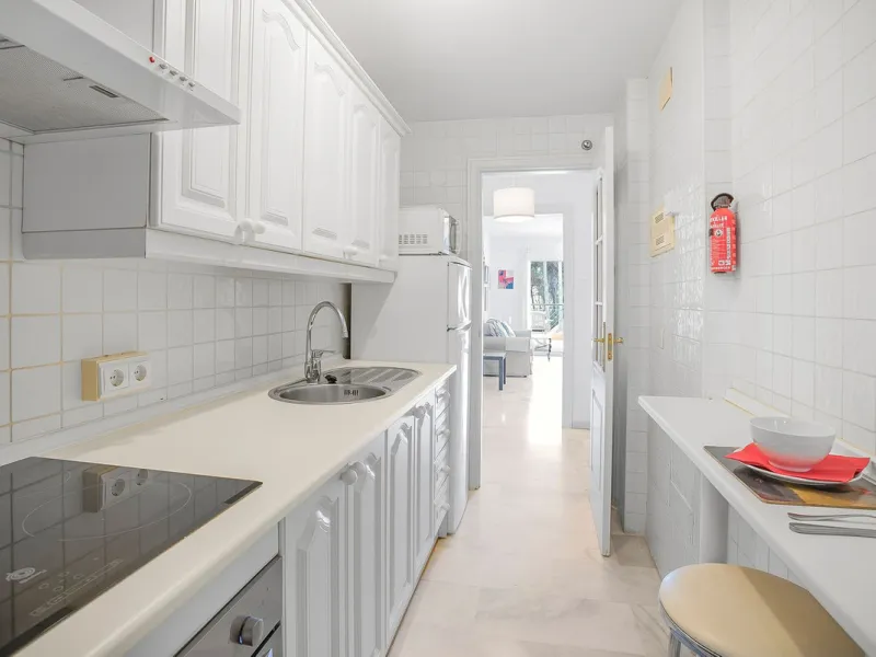 LOCATION! Discover the perfect coastal retreat with this beachfront first-floor apartment located in the prestigious community of Calahonda. This charming flat features two spacious bedrooms and two bathrooms, providing ample space for relaxation and comf